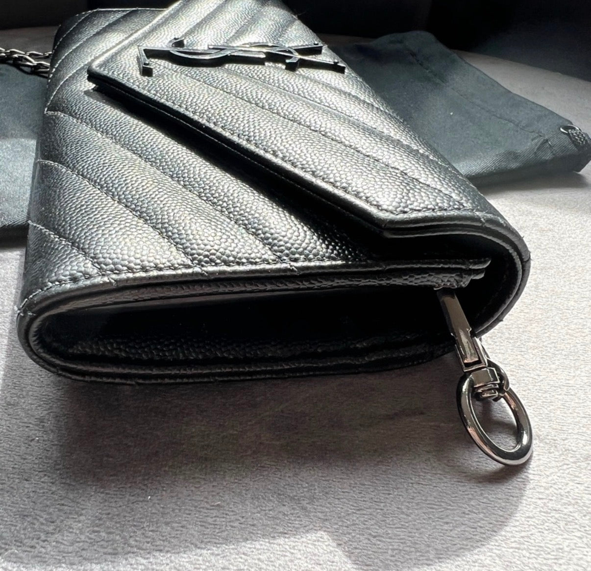 YSL Cassandre all black envelope flap wallet on chain