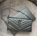 YSL Cassandre all black envelope flap wallet on chain