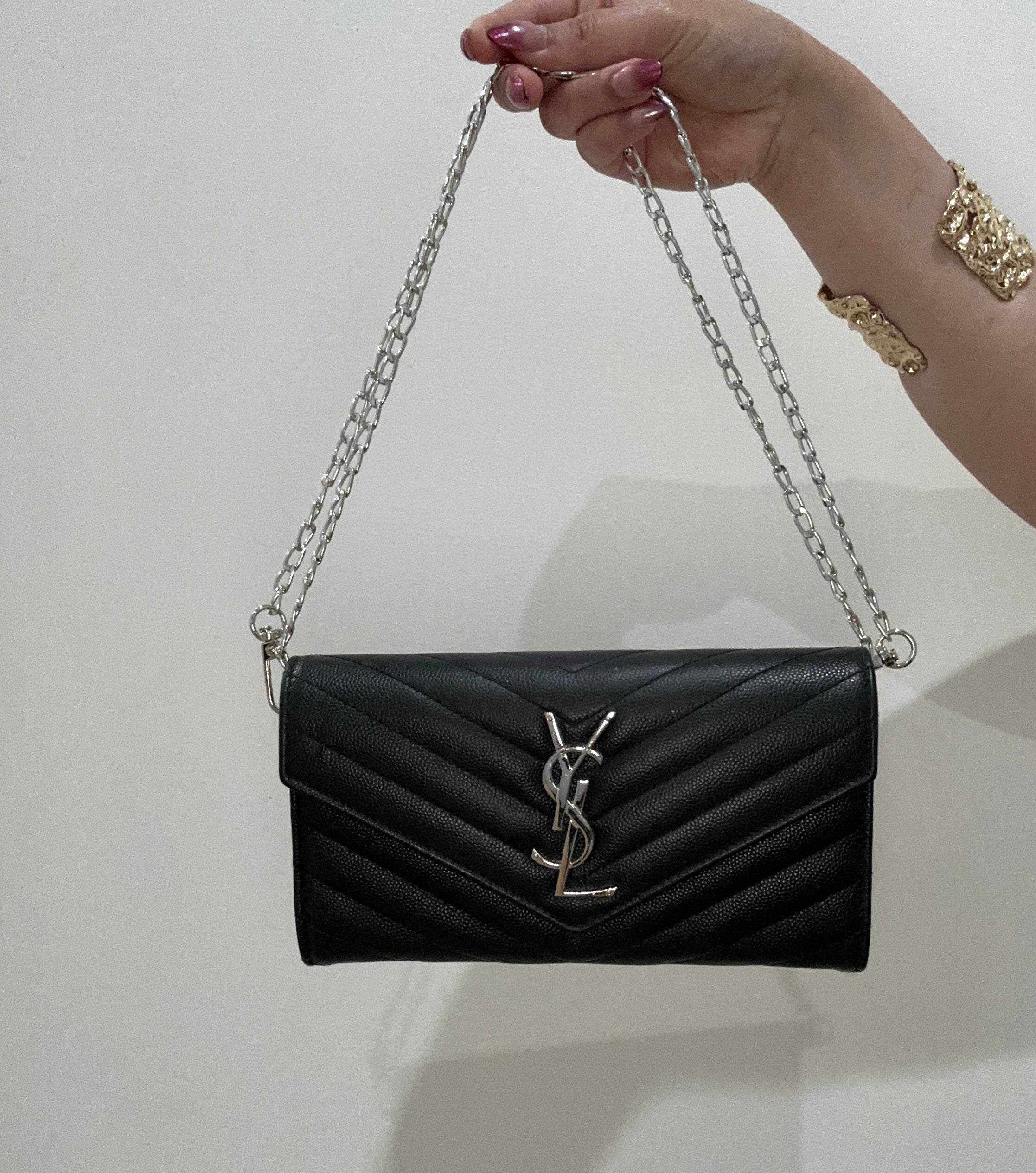 Black YSL cassandre envelope wallet on chain