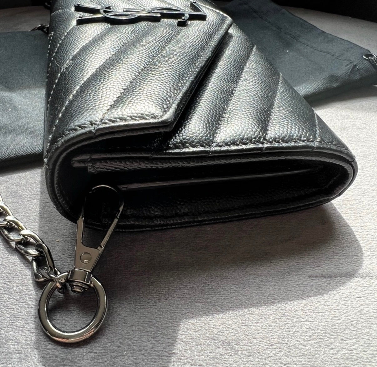 YSL Cassandre all black envelope flap wallet on chain
