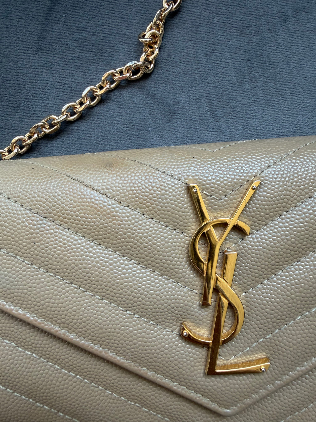 Beige YSL cassandre wallet on chain