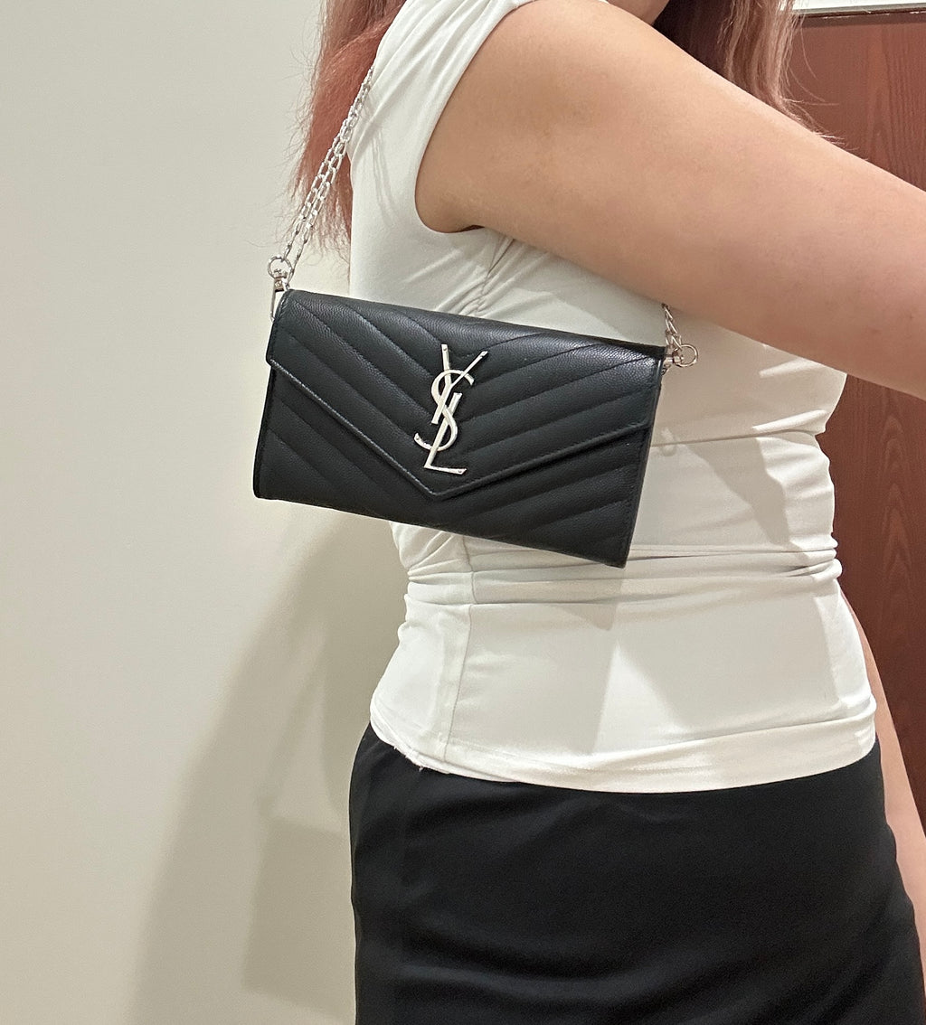 Black YSL cassandre envelope wallet on chain