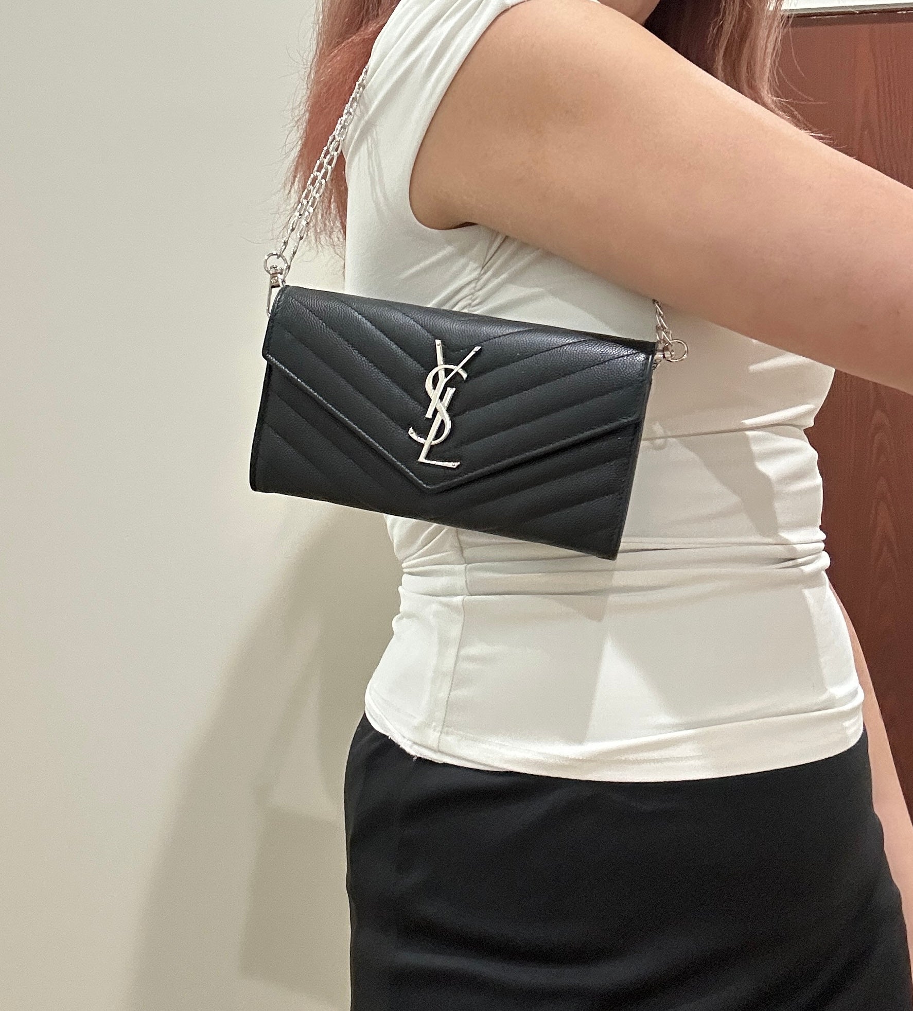 Black YSL cassandre envelope wallet on chain