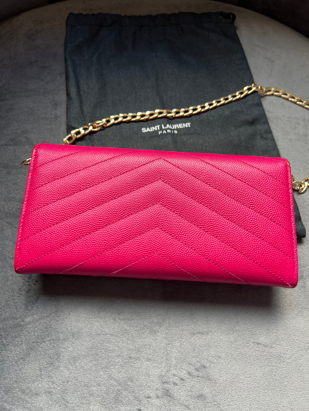 Pink Saint Laurent wallet on chain