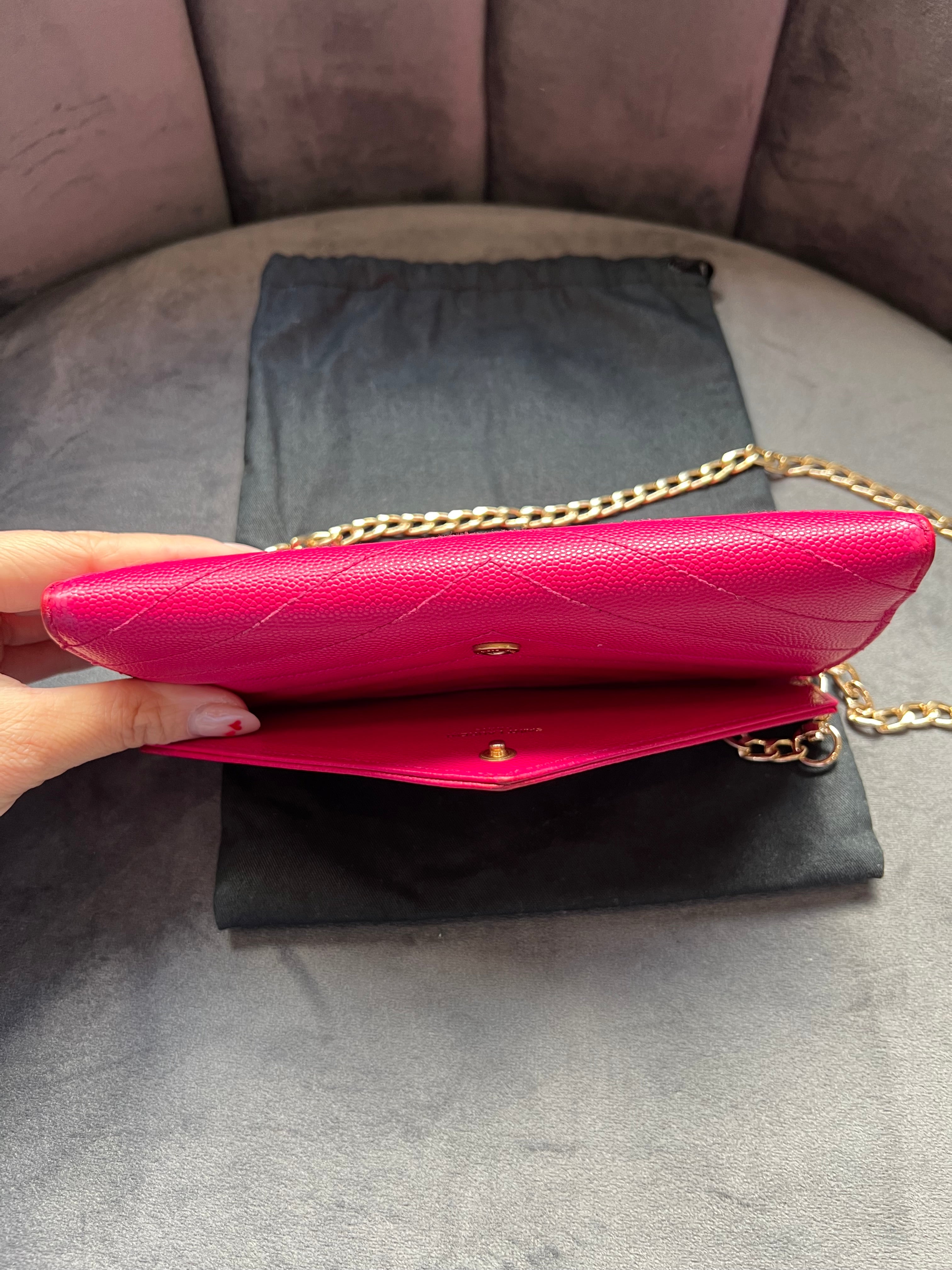 Pink Saint Laurent wallet on chain