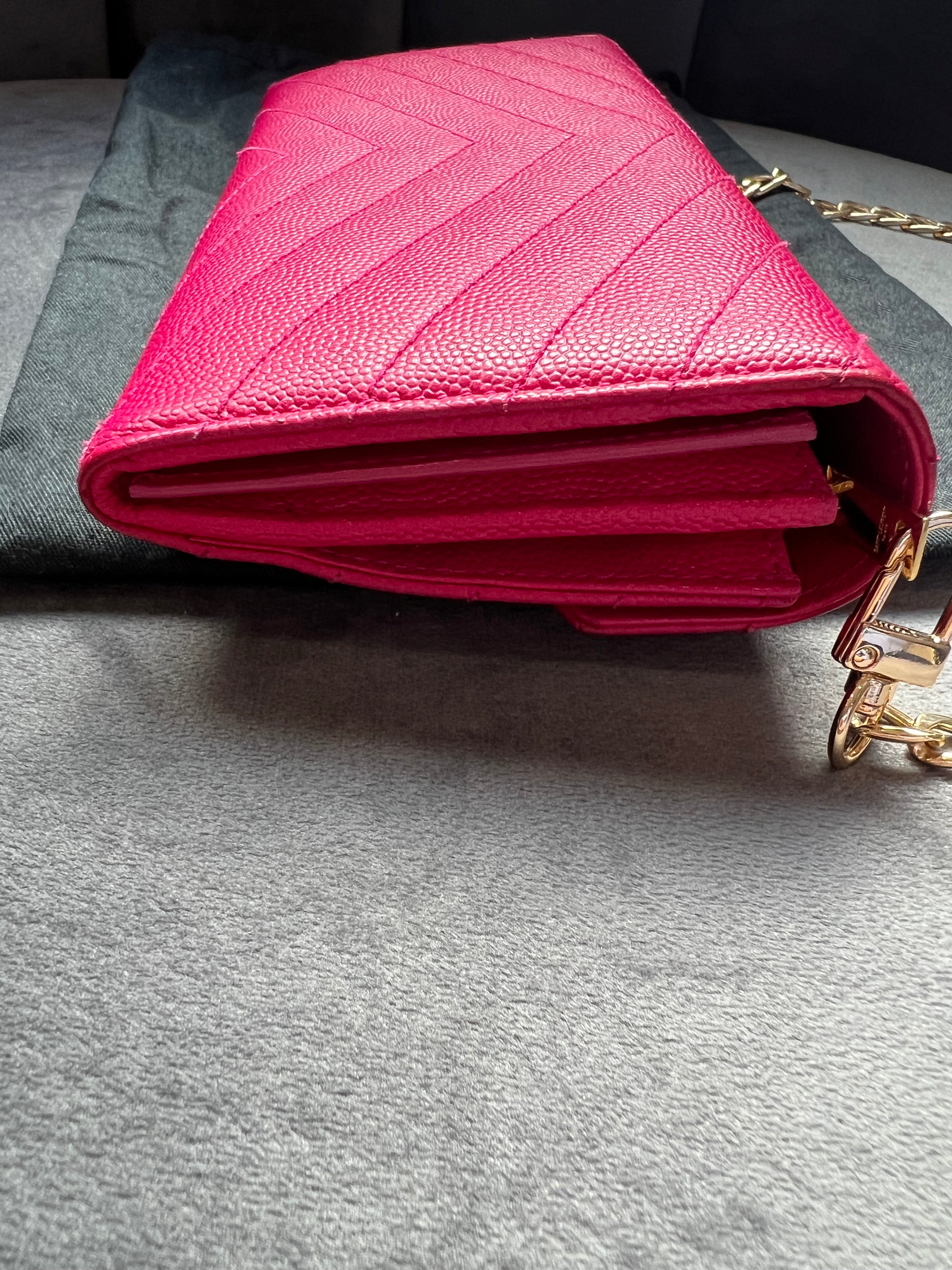 Pink Saint Laurent wallet on chain