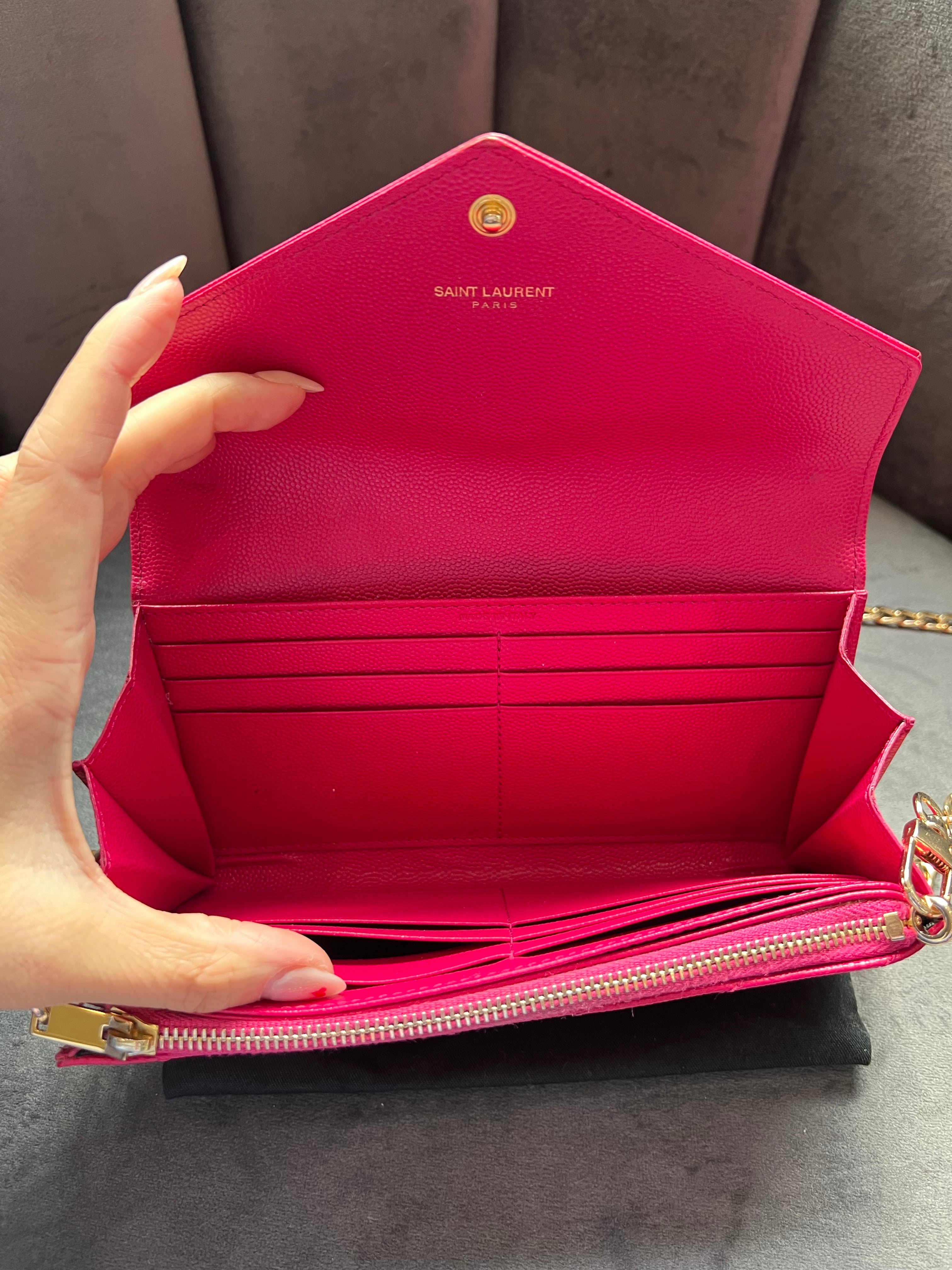 Pink Saint Laurent wallet on chain