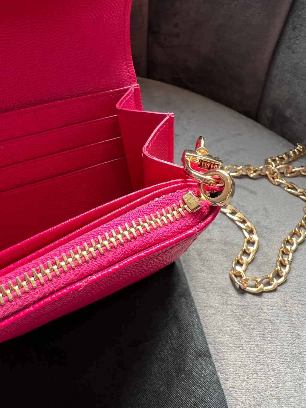 Pink Saint Laurent wallet on chain