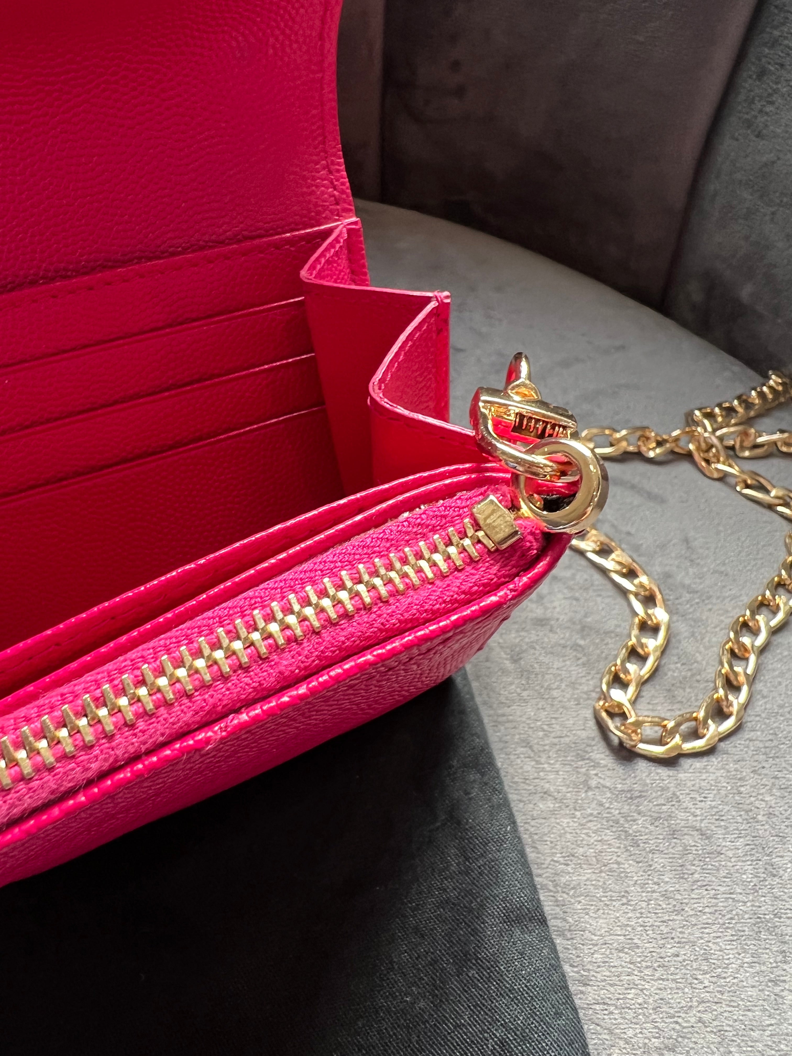 Pink Saint Laurent wallet on chain