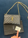 Black YSL monogram clutch wallet on chain