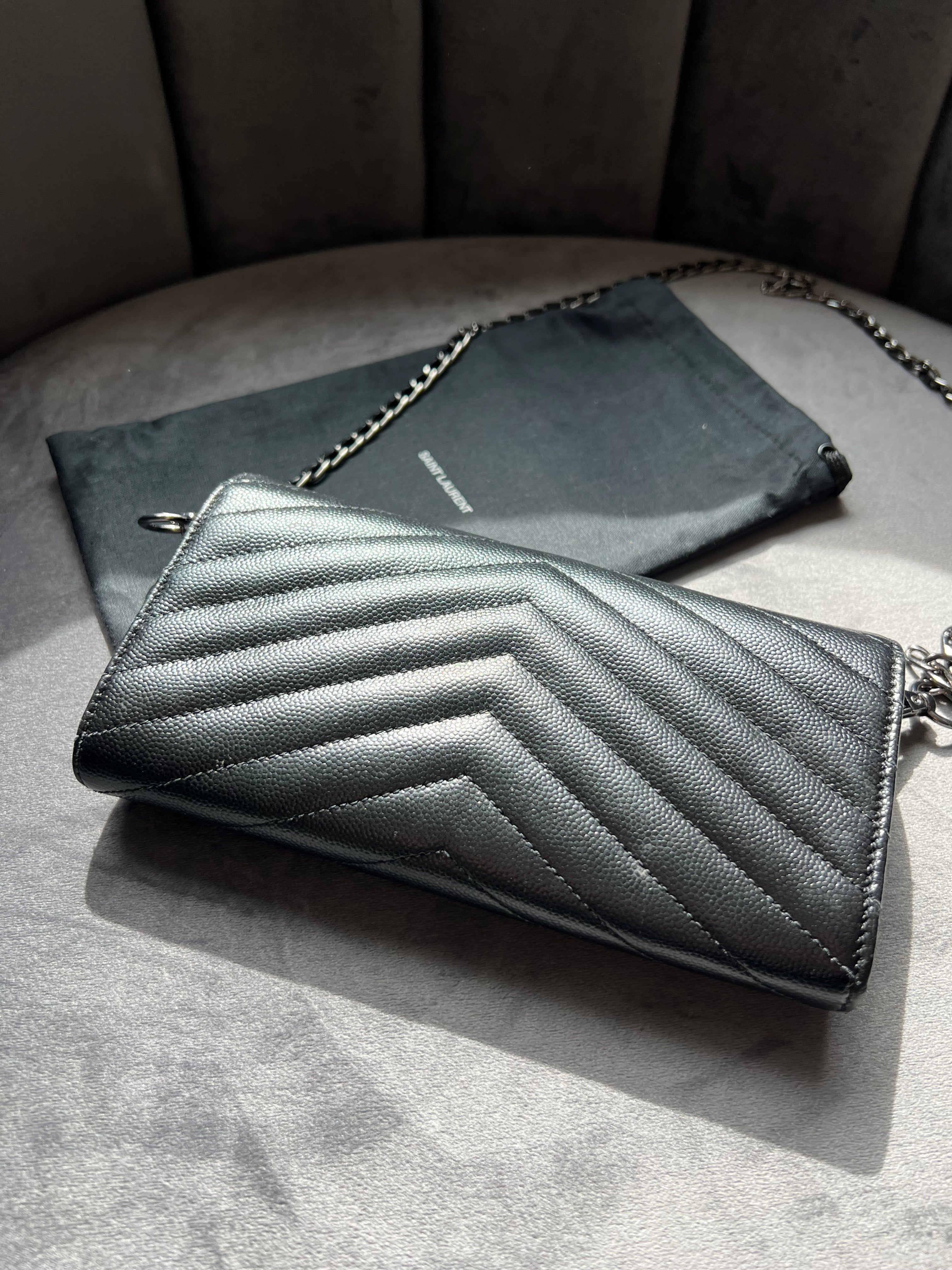 YSL Cassandre all black envelope flap wallet on chain