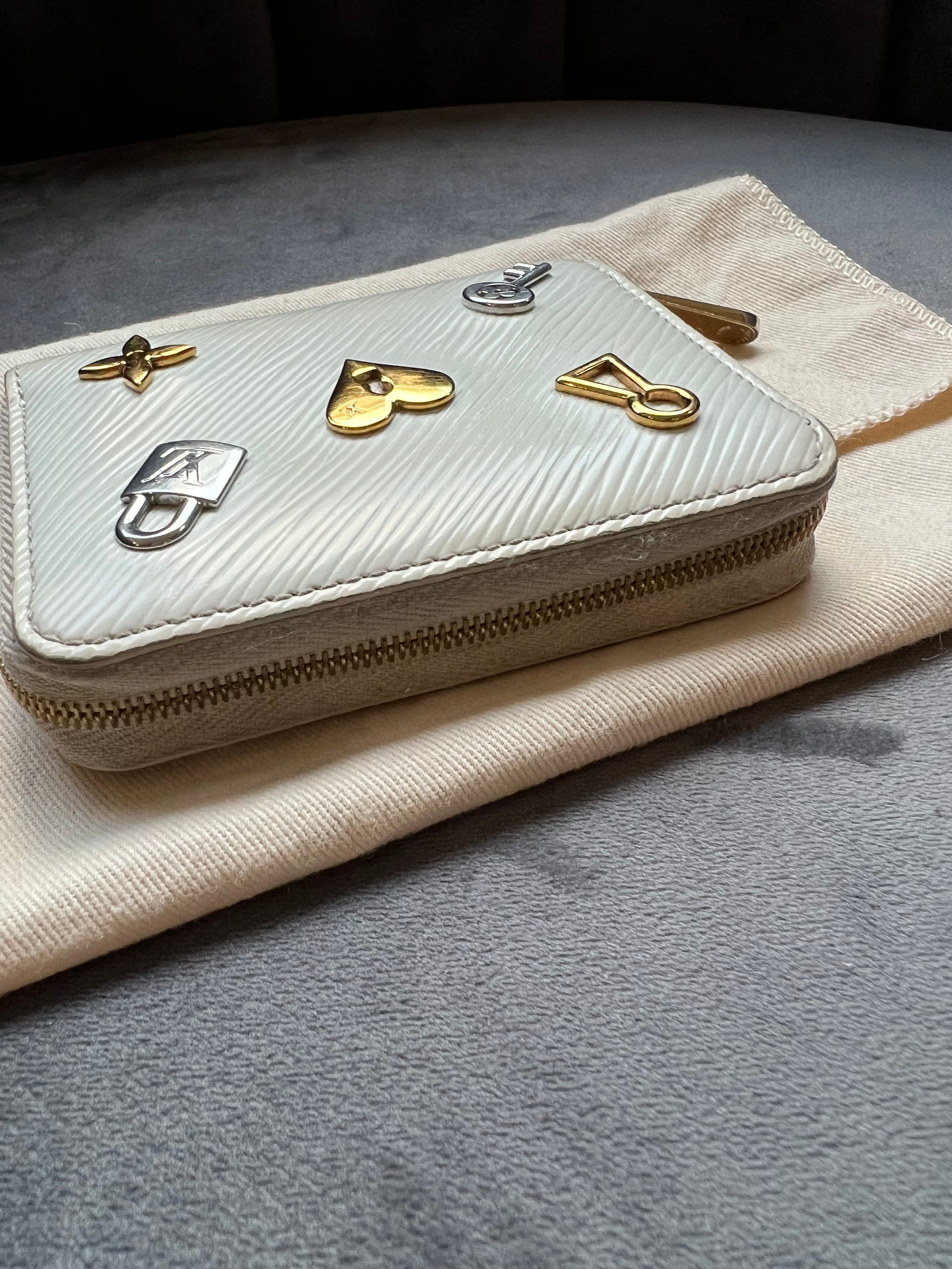 LOUIS VUITTON Love Lock Zippy Wallet White Epi Leather