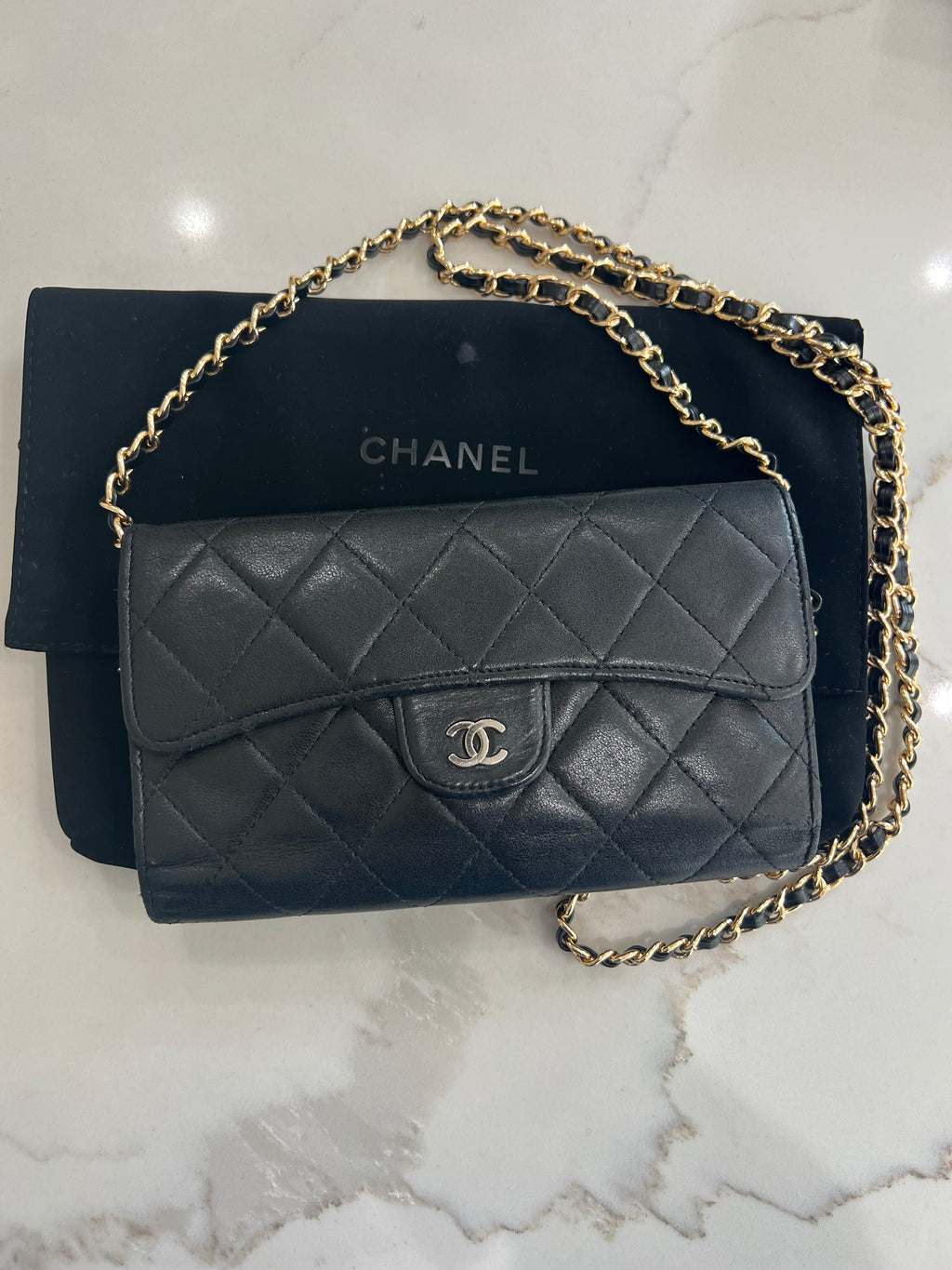 Black Chanel timeless wallet on chain