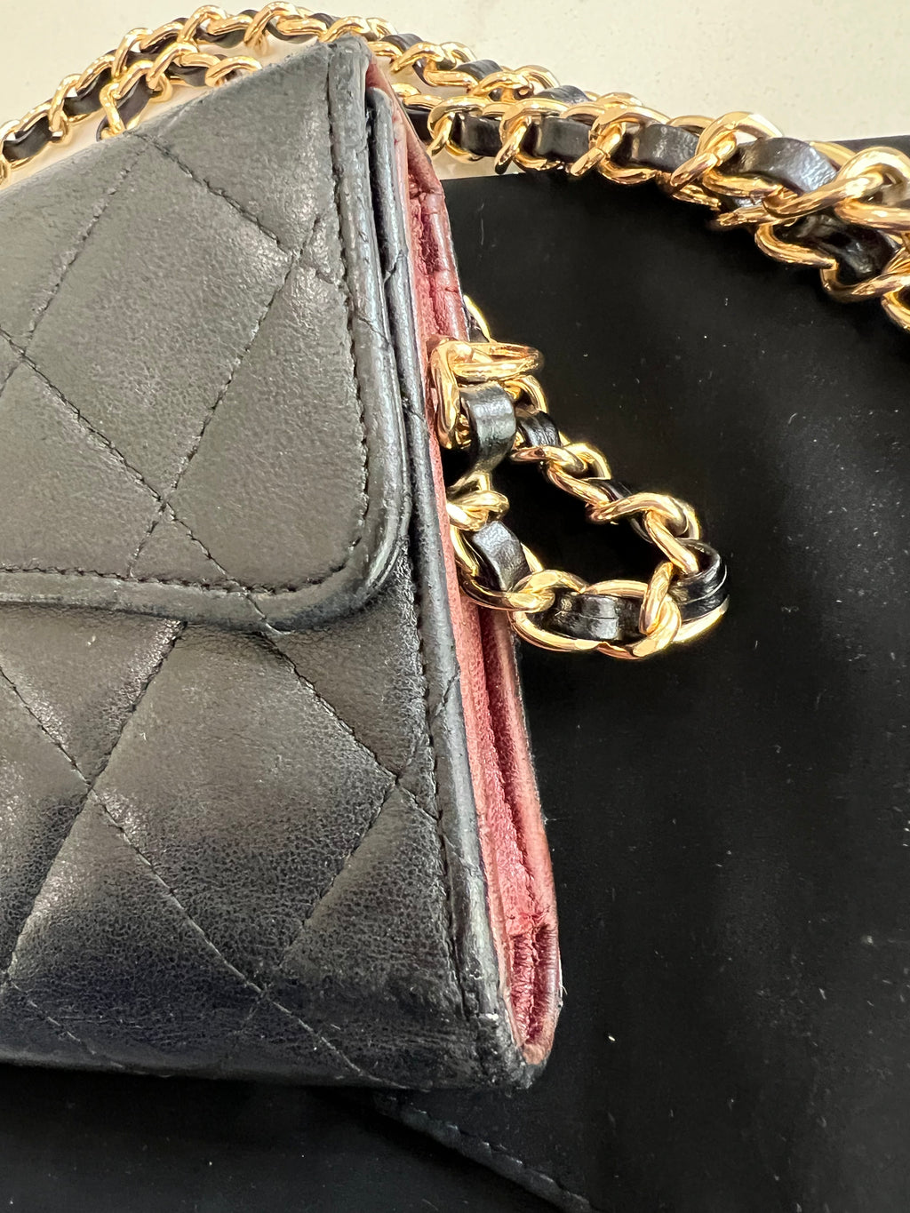 Black Chanel timeless wallet on chain