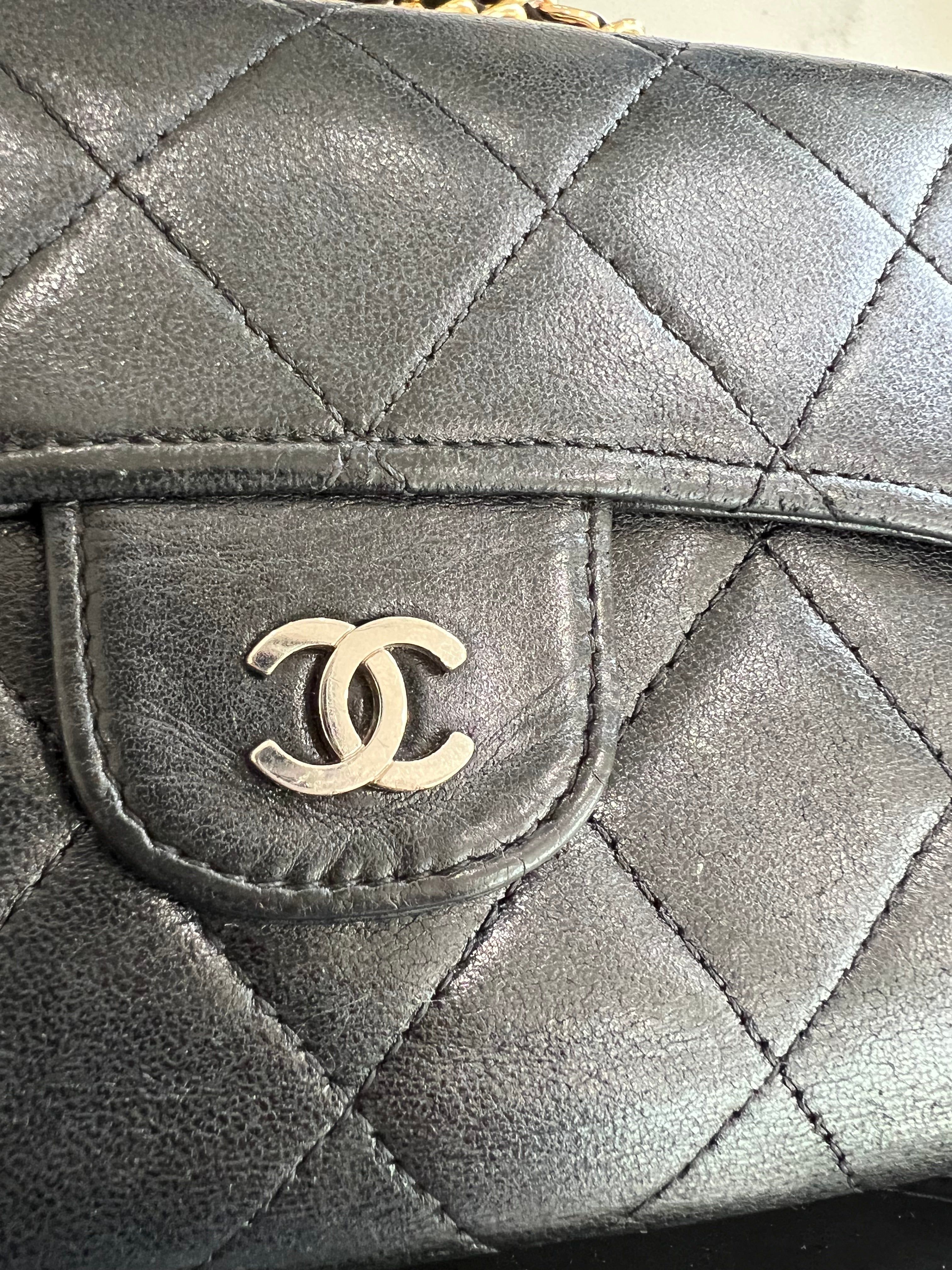 Black Chanel timeless wallet on chain