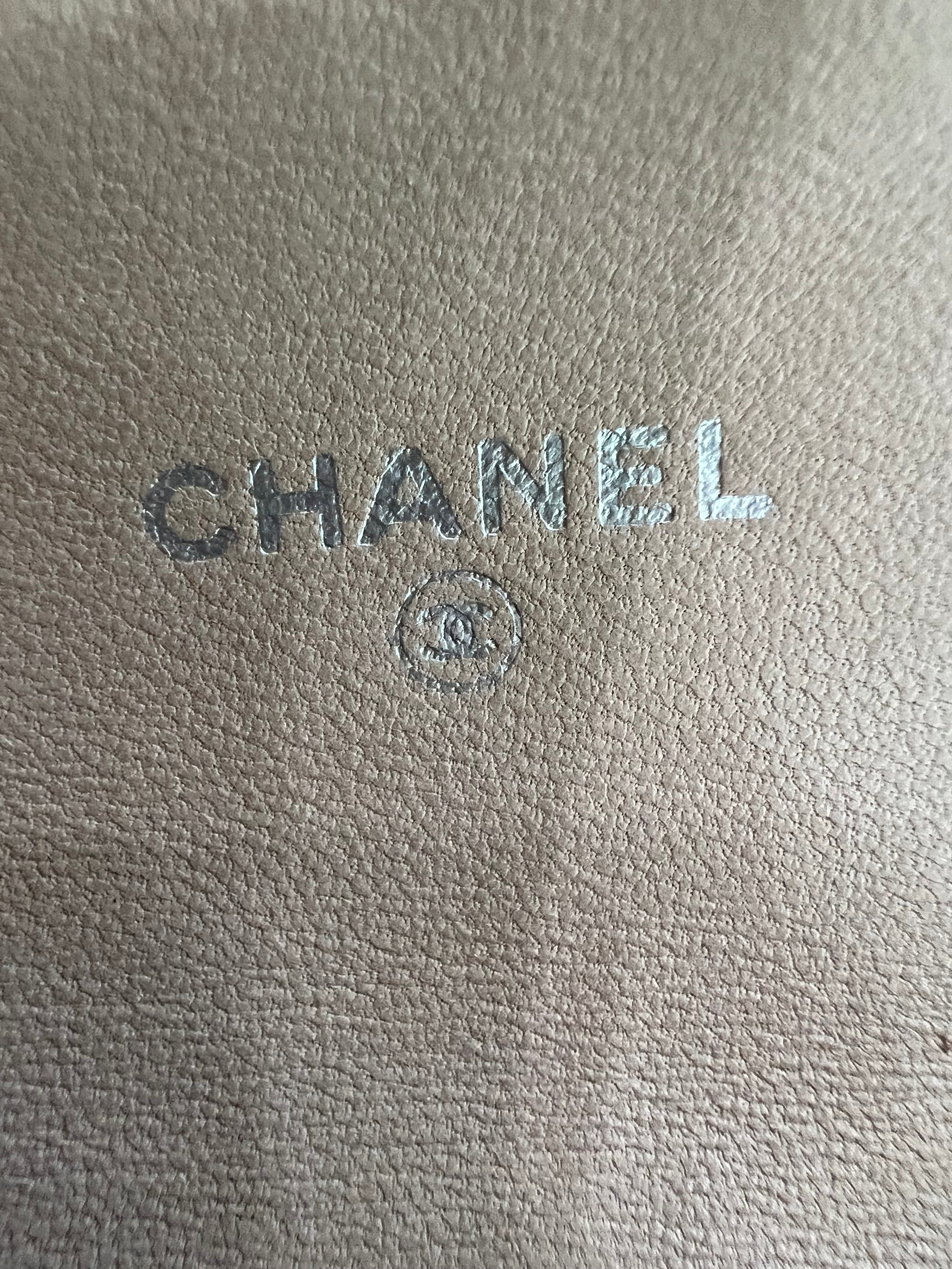 Beige gusseted Chanel timeless wallet on chain