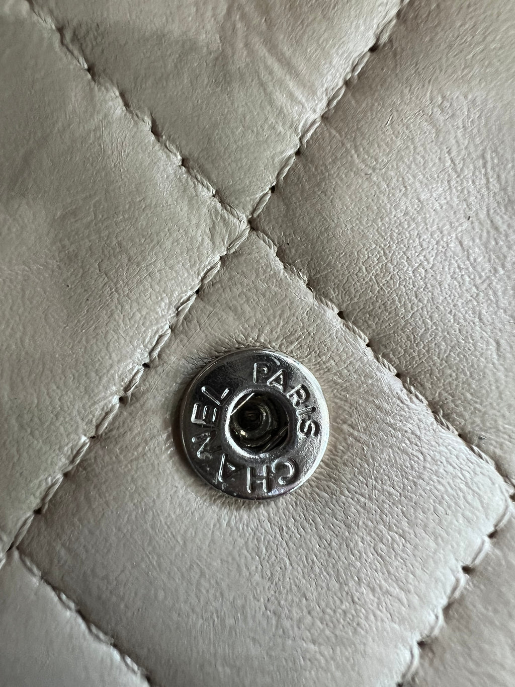 Beige gusseted Chanel timeless wallet on chain