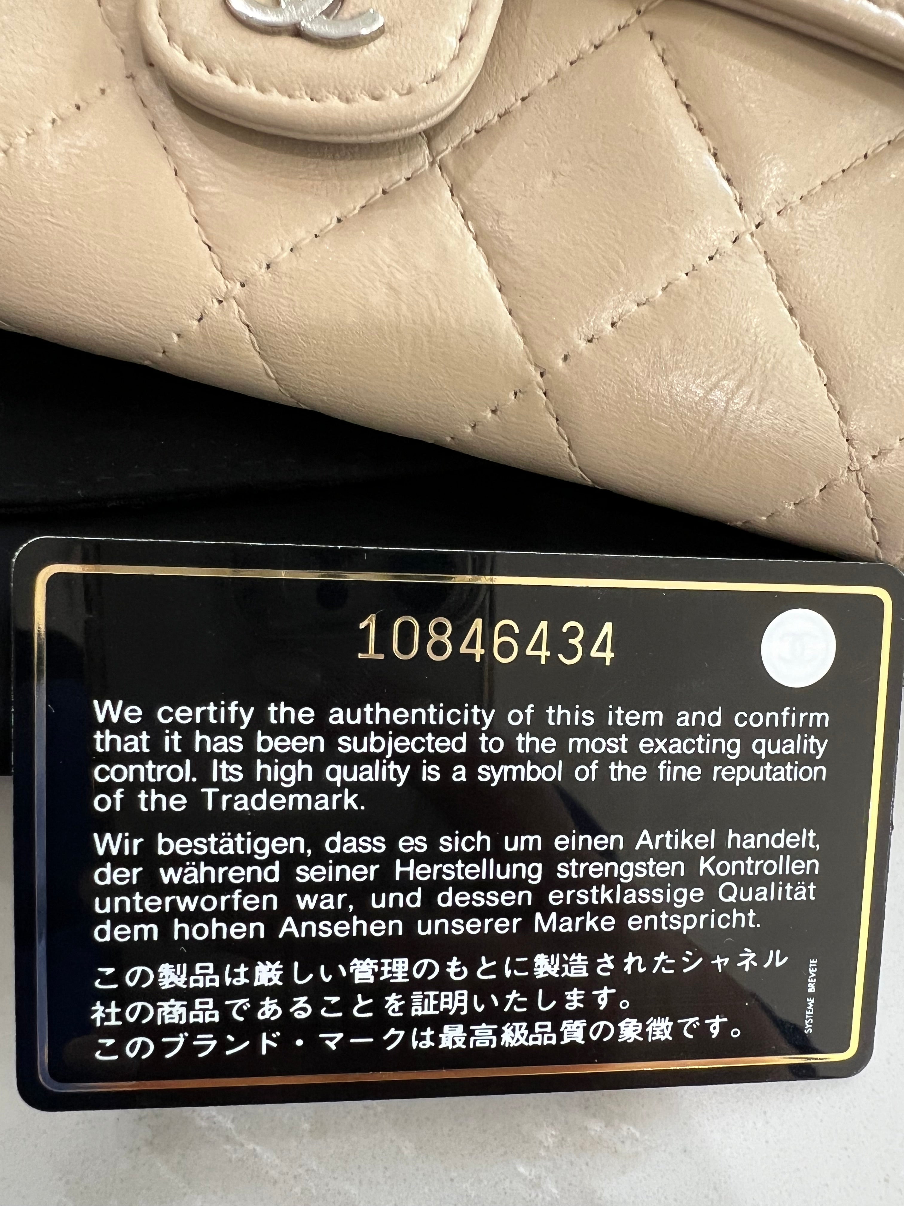 Beige gusseted Chanel timeless wallet on chain