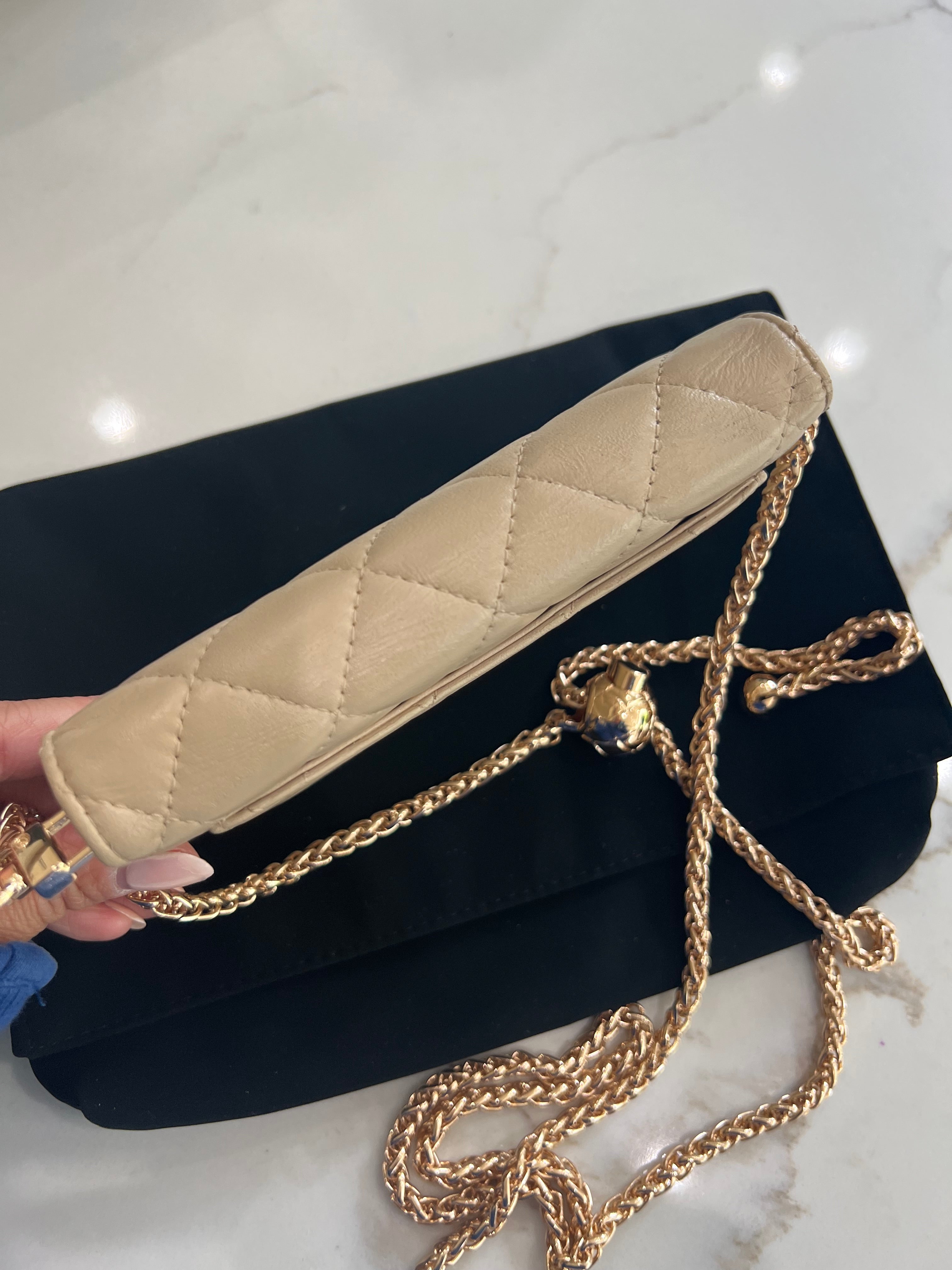 Beige gusseted Chanel timeless wallet on chain