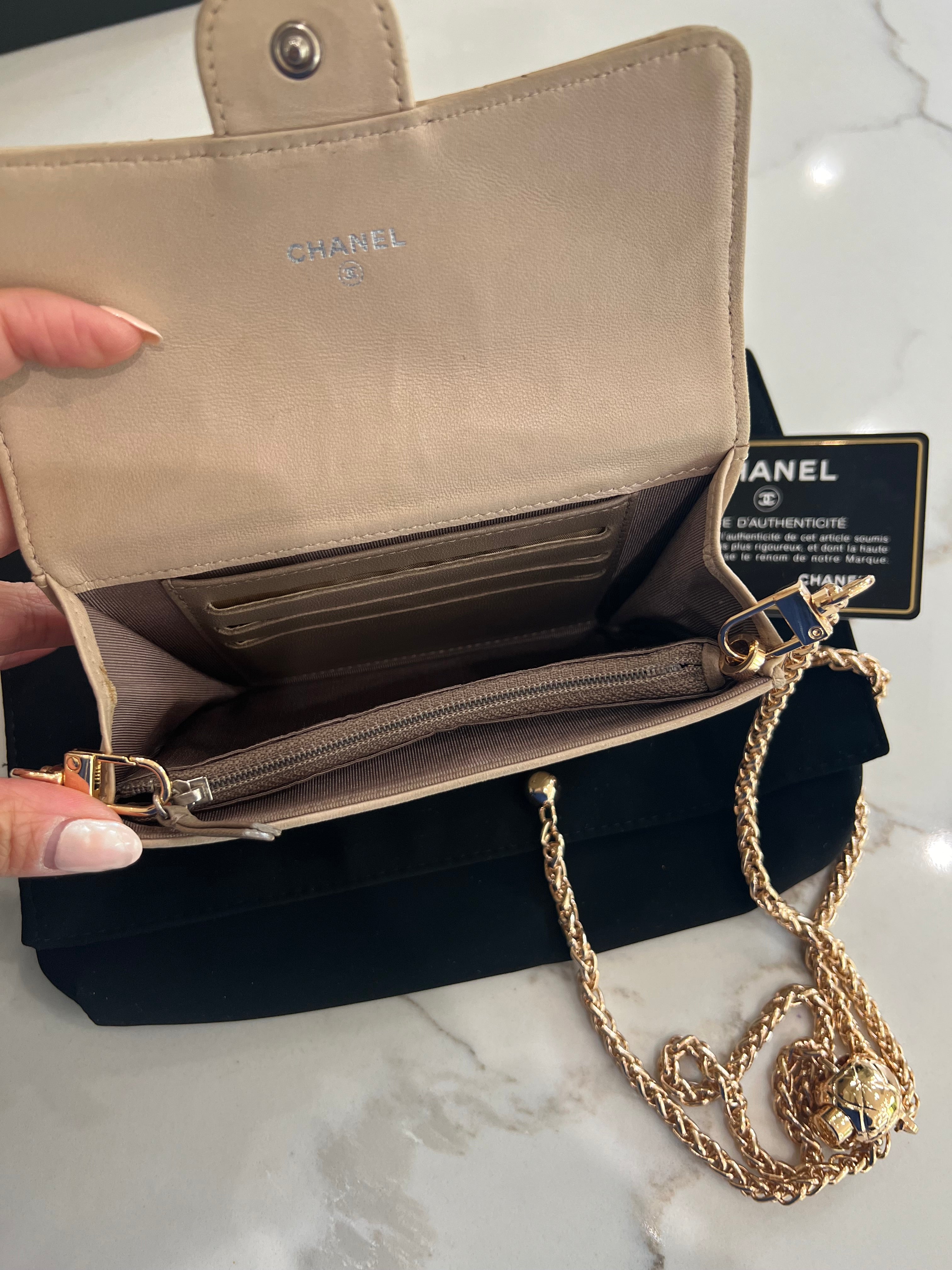 Beige gusseted Chanel timeless wallet on chain