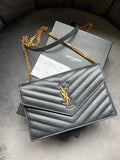 Yves Saint Laurent Cassandre envelope flap crossbody bag