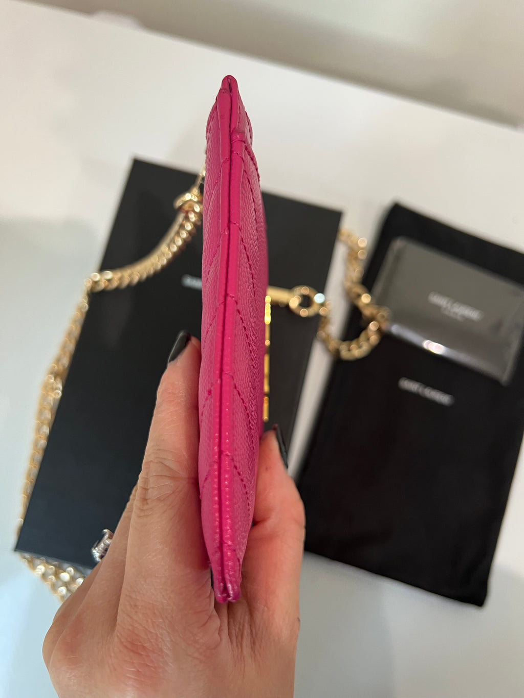 Pink YSL monogram clutch on chain