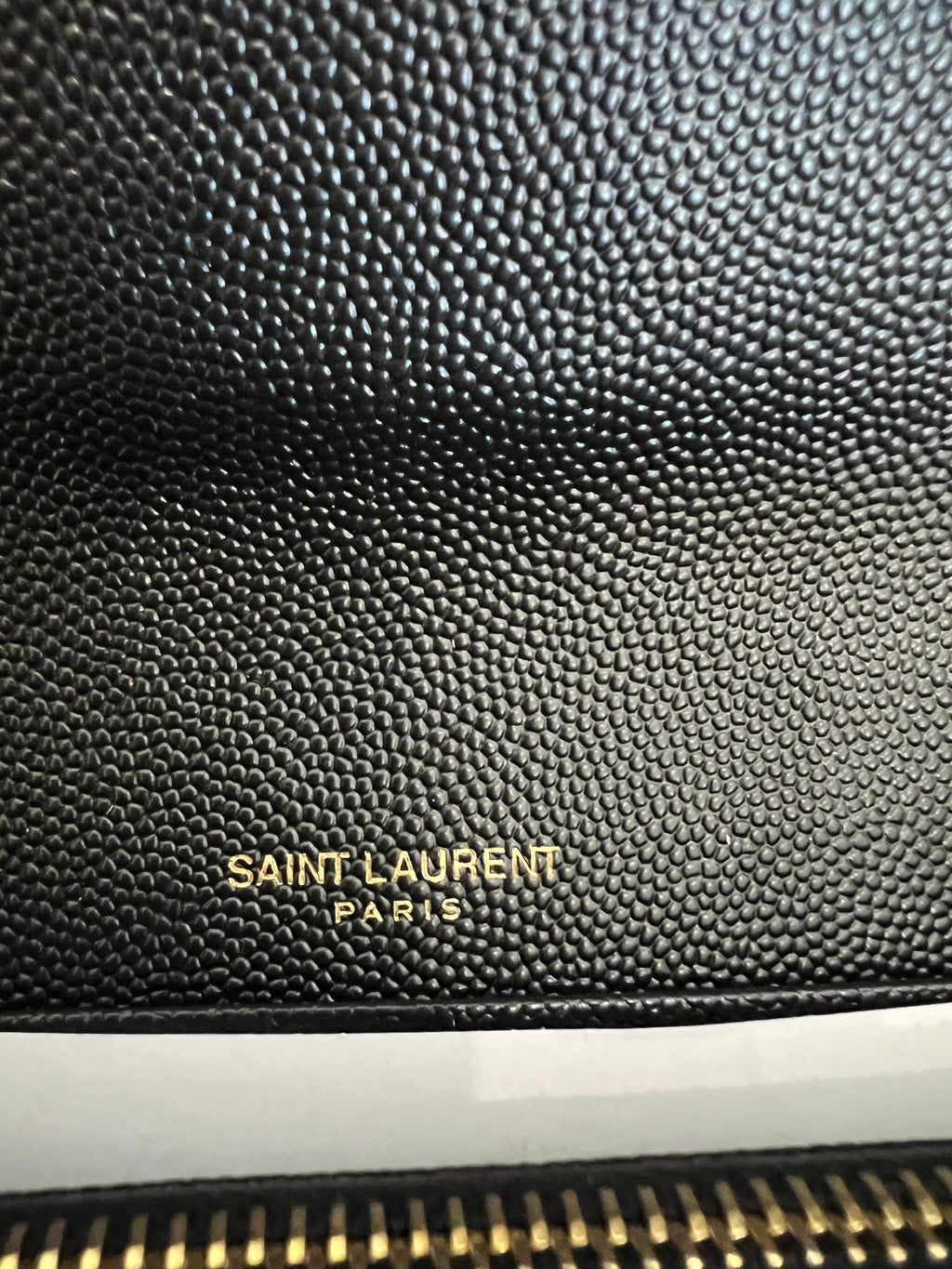 Black YSL cassandre envelope wallet on chain