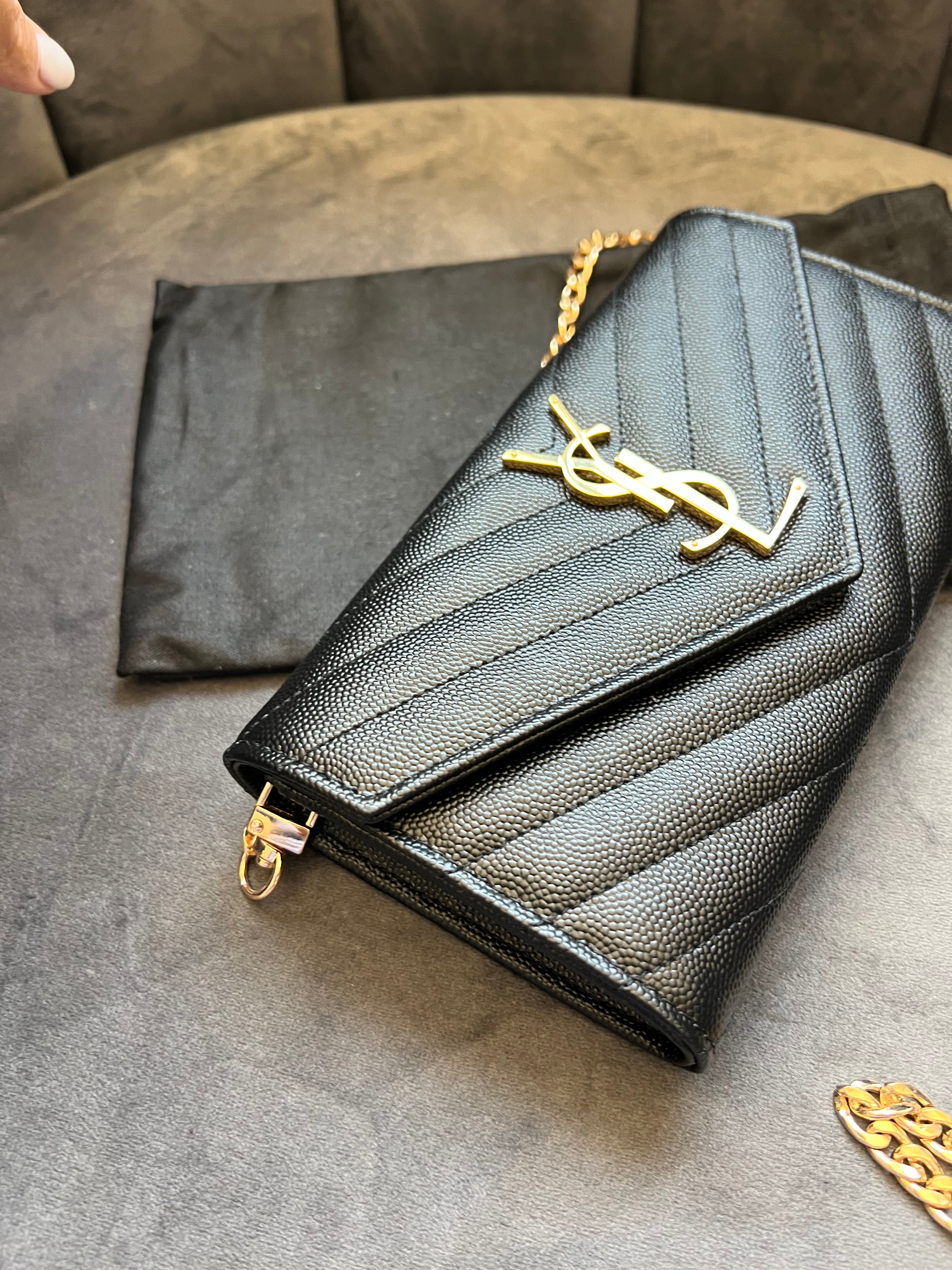 Black YSL cassandre envelope wallet on chain