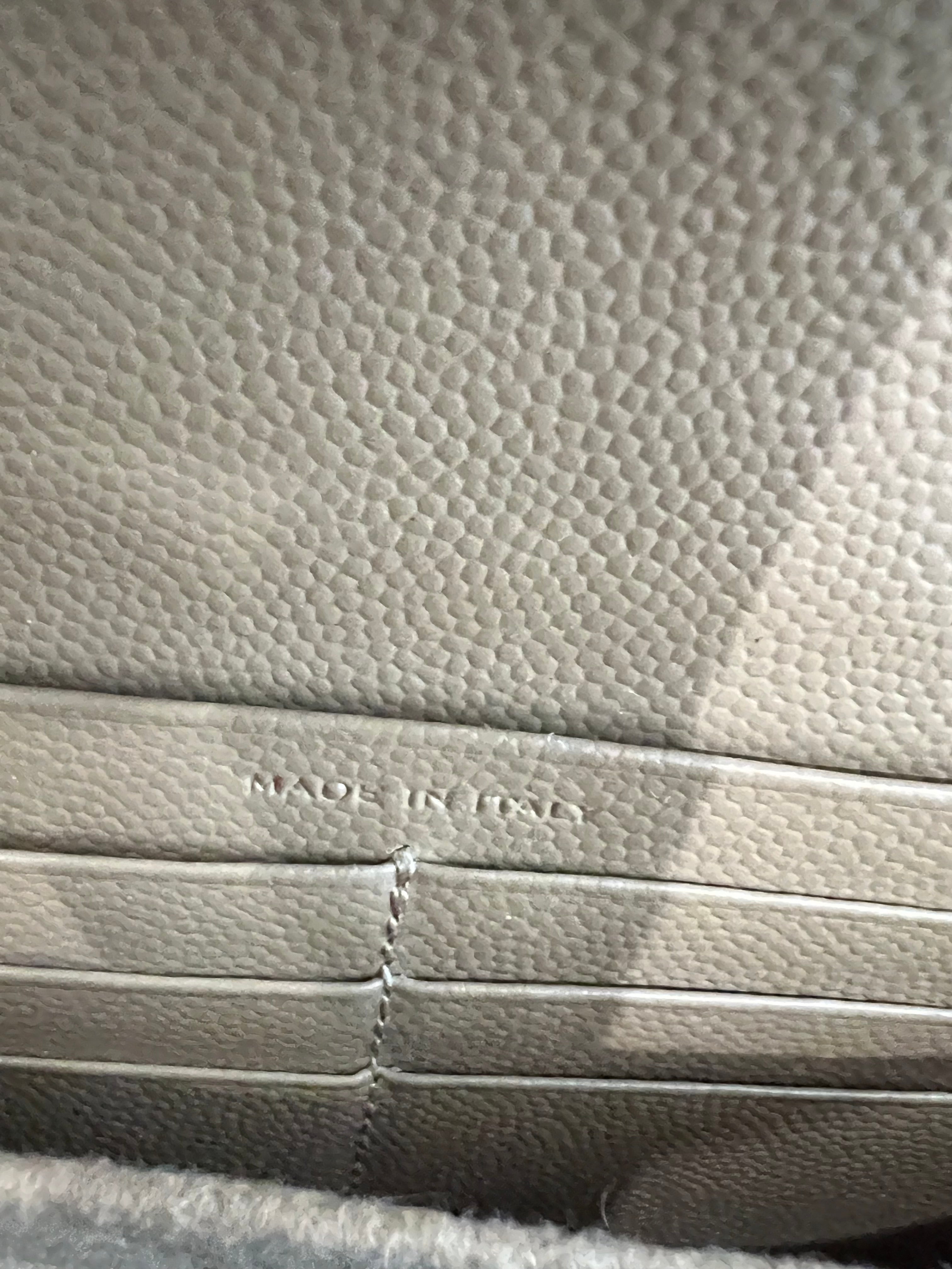 Beige YSL cassandre wallet on chain