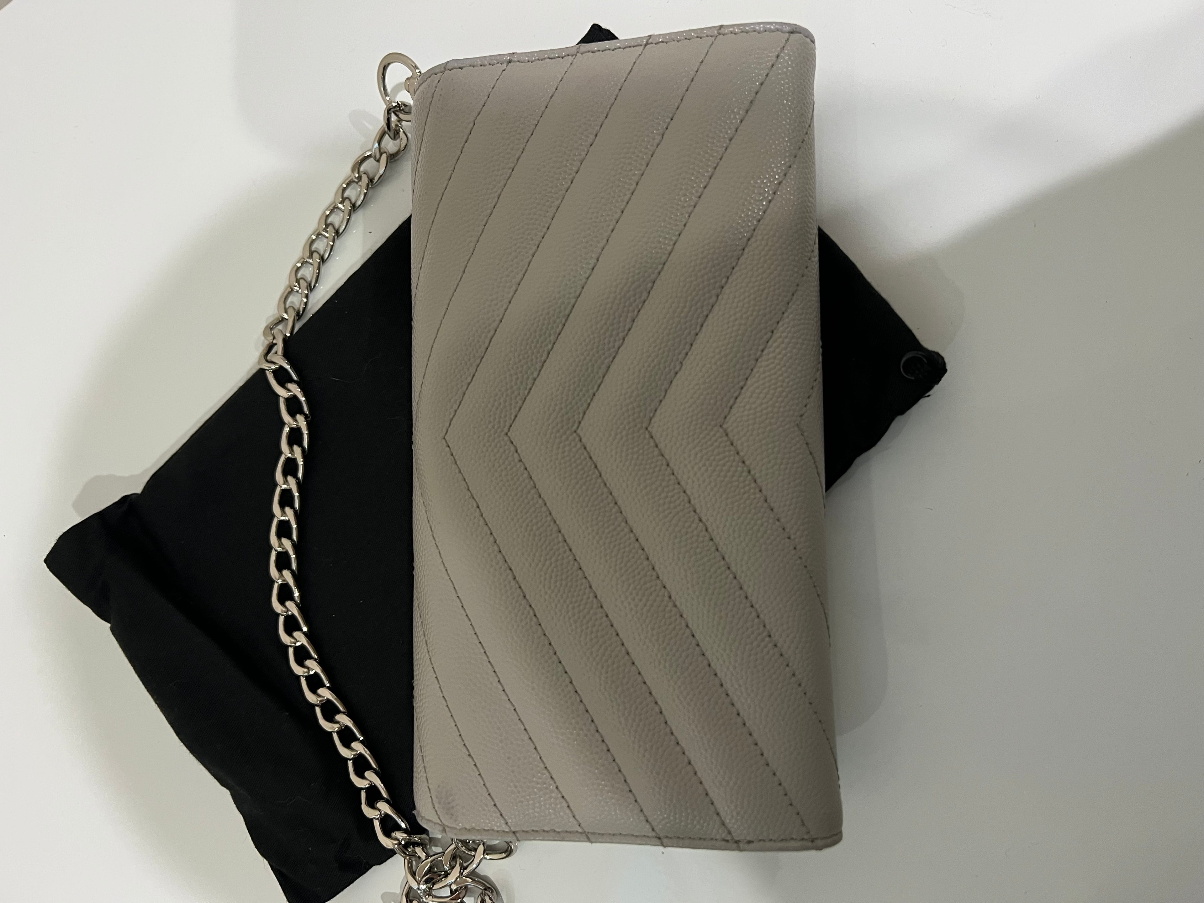 Grey YSL monogram wallet on chain