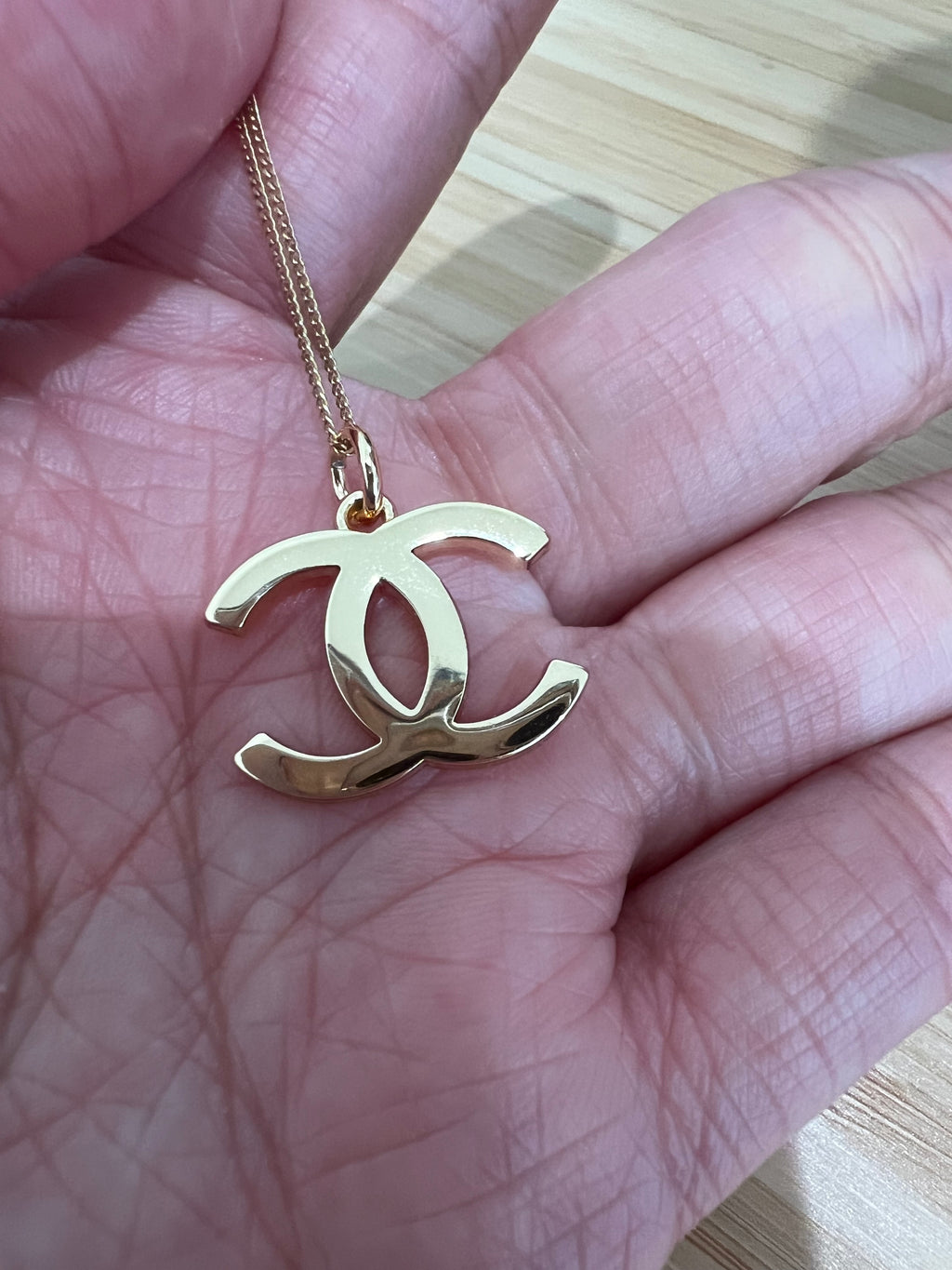 Chanel CC charm necklace