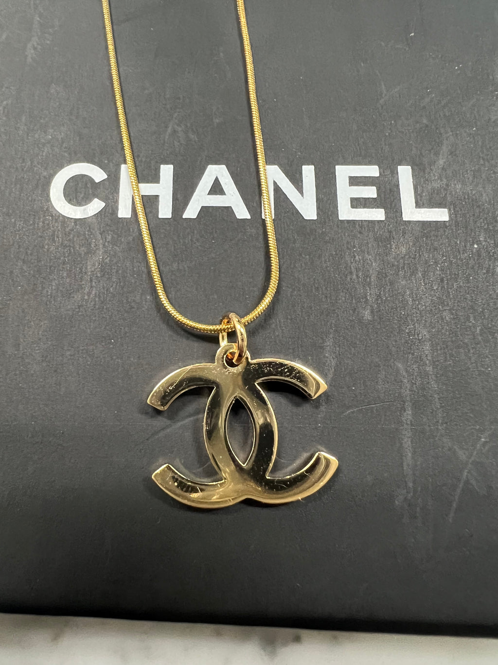Chanel CC charm necklace