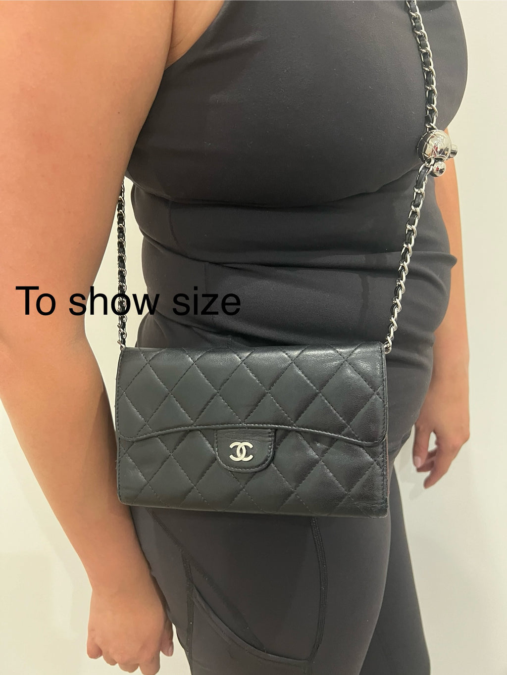 Black Chanel timeless wallet on chain