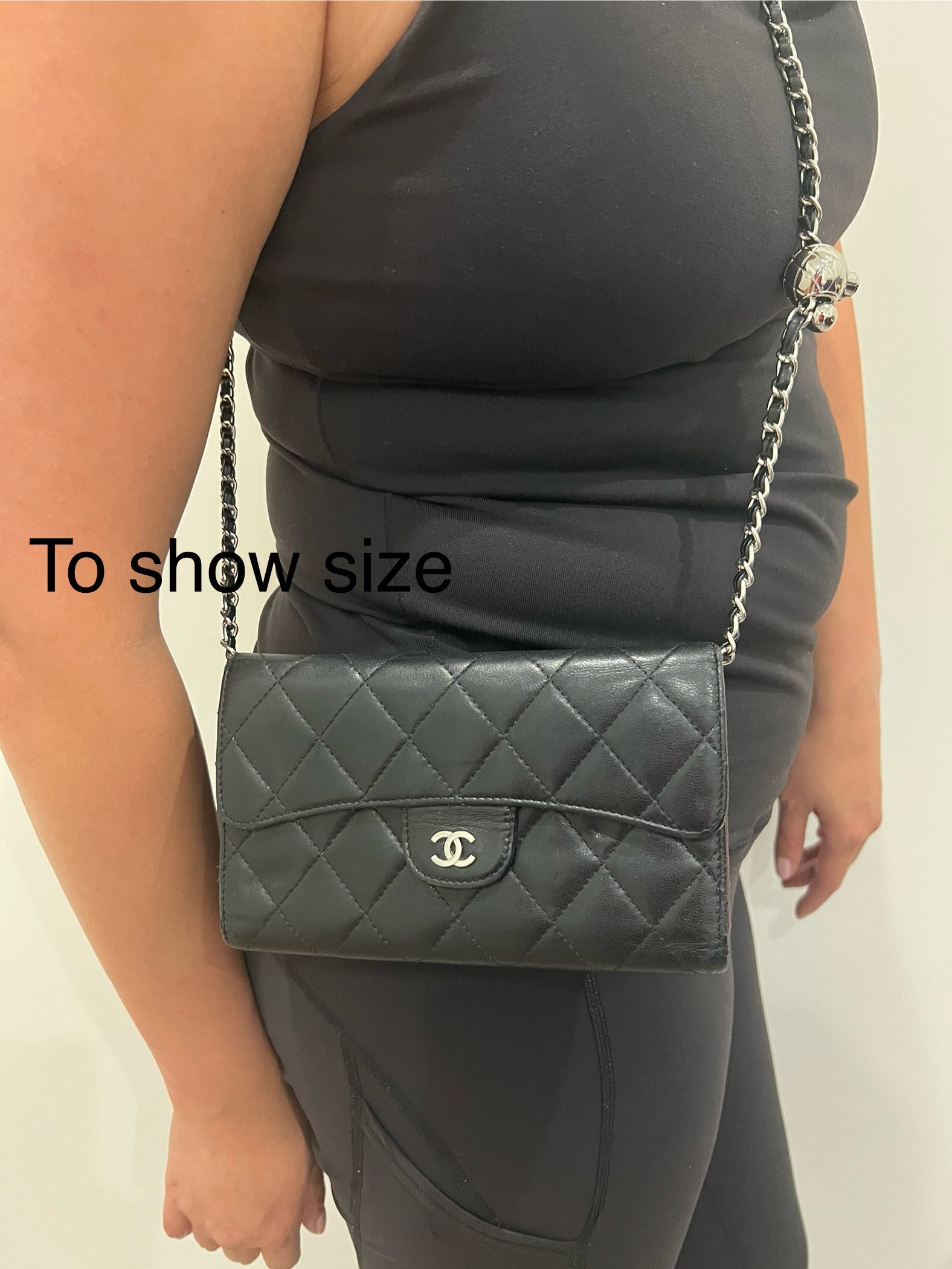 Black Chanel timeless wallet on chain