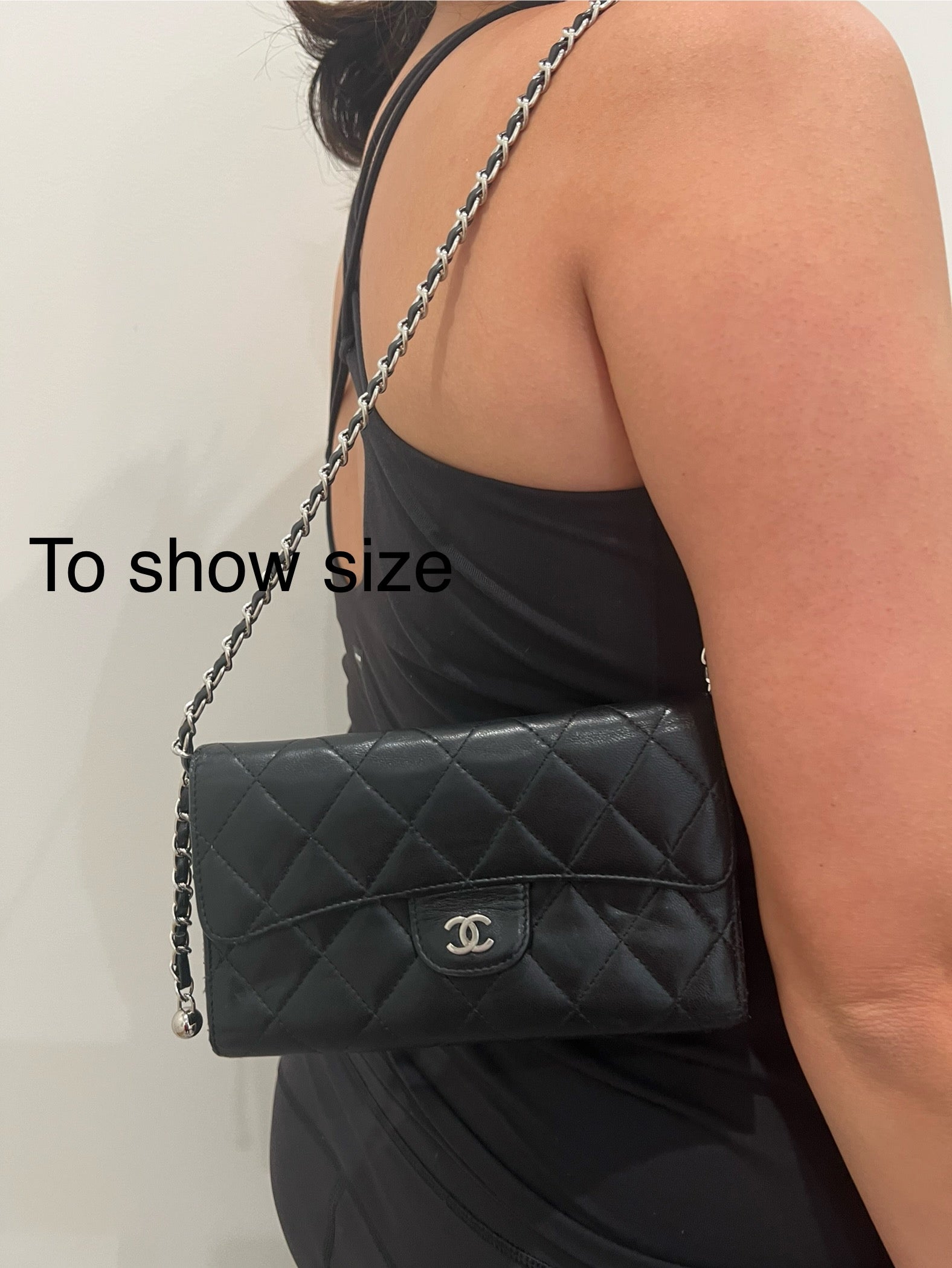 Black Chanel timeless wallet on chain