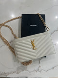 Creme YSL monogram clutch wallet on chain