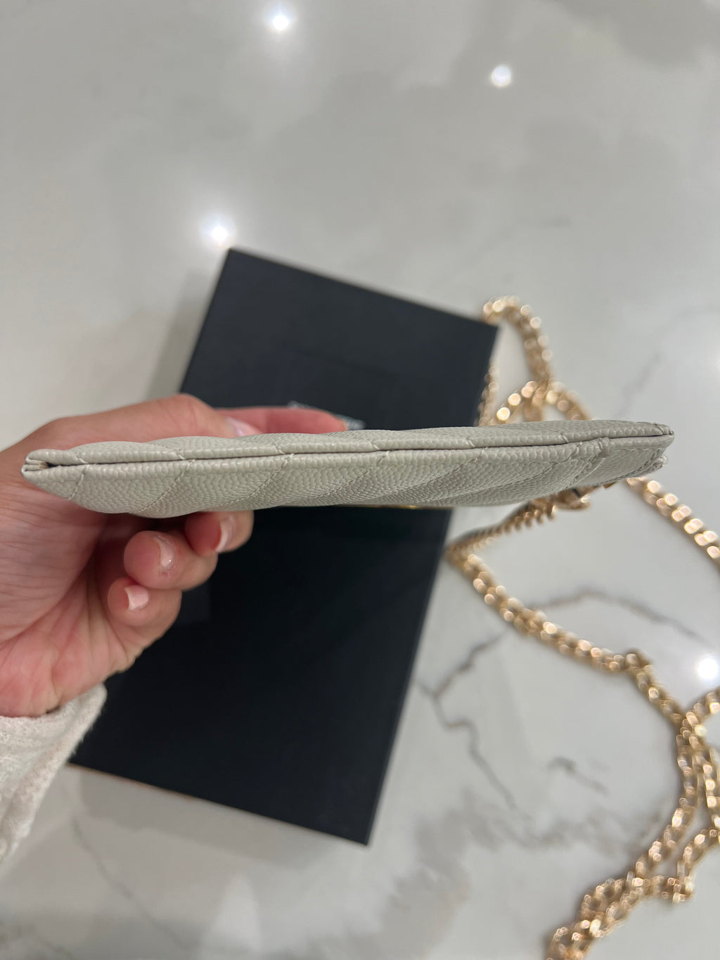Creme YSL monogram clutch wallet on chain