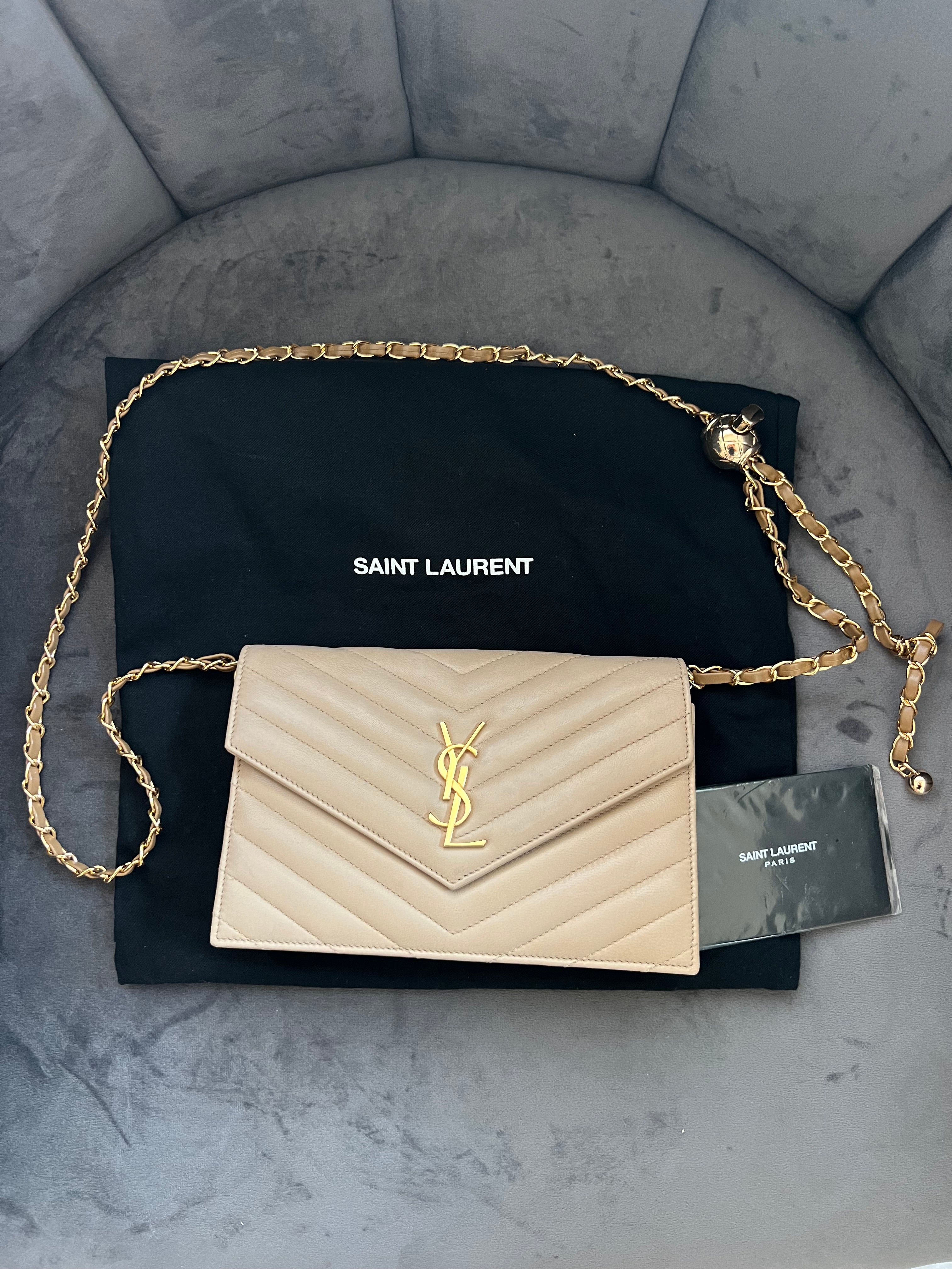 Yves Saint Laurent Cassandre beige envelope flap crossbody bag