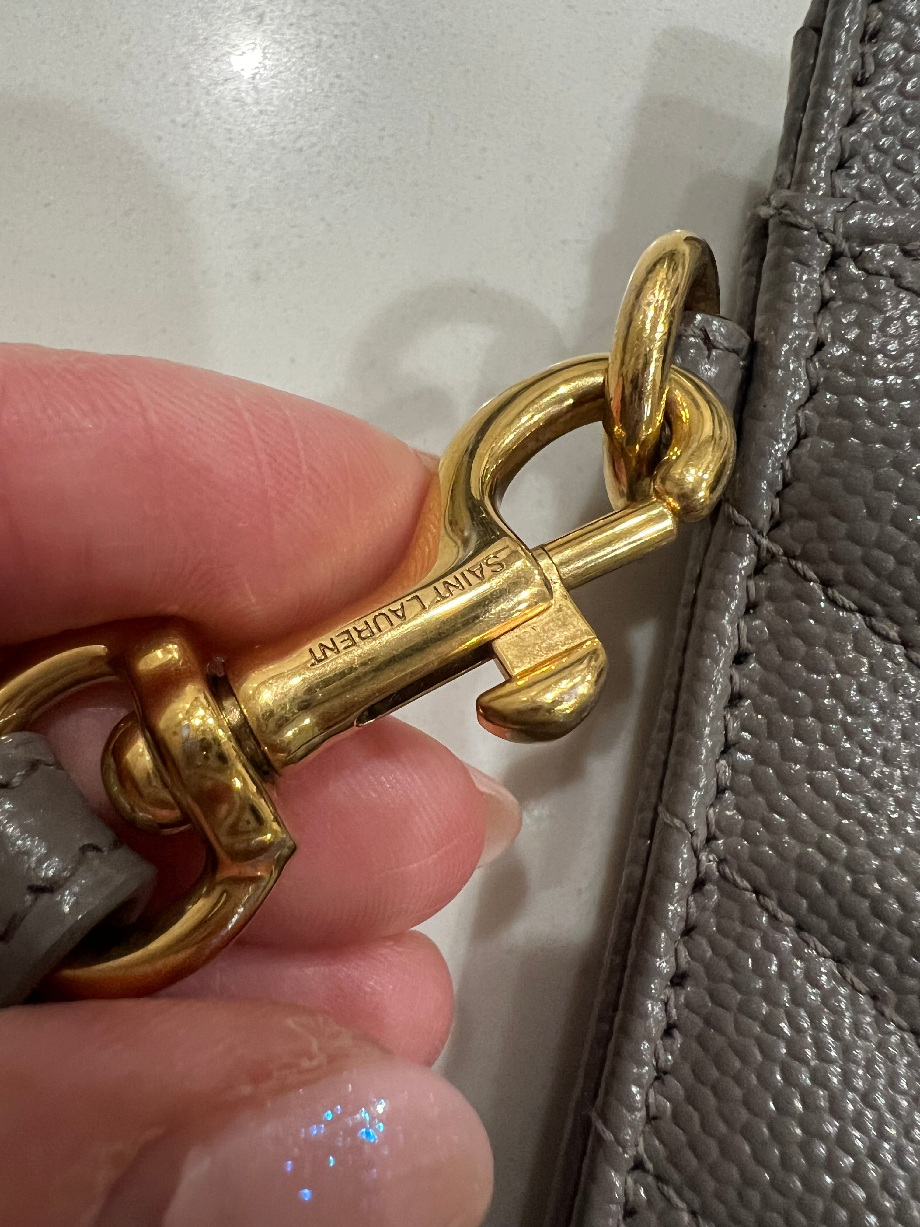 Yves Saint Laurent monogram matelasse wristlet