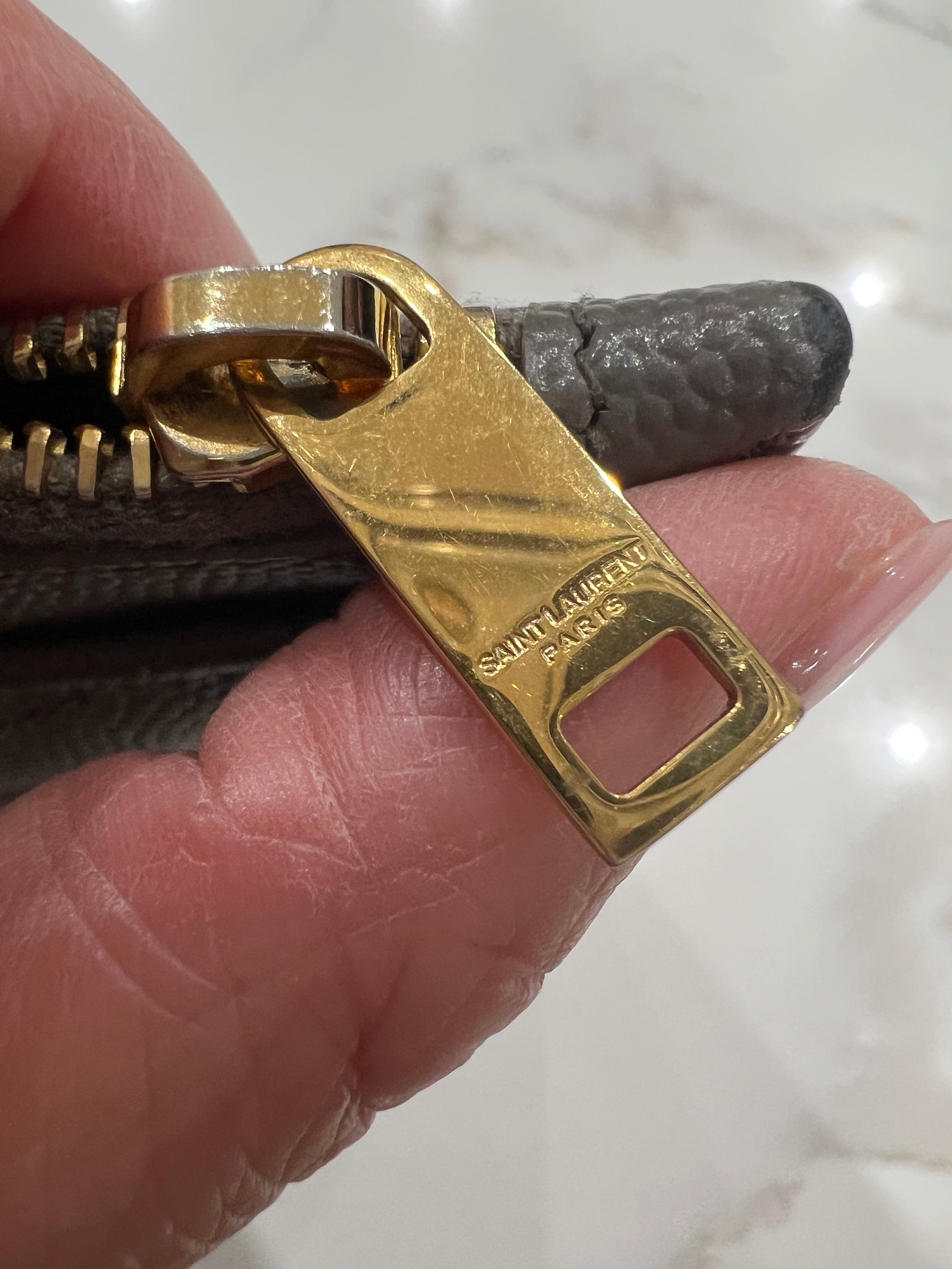 Yves Saint Laurent monogram matelasse wristlet