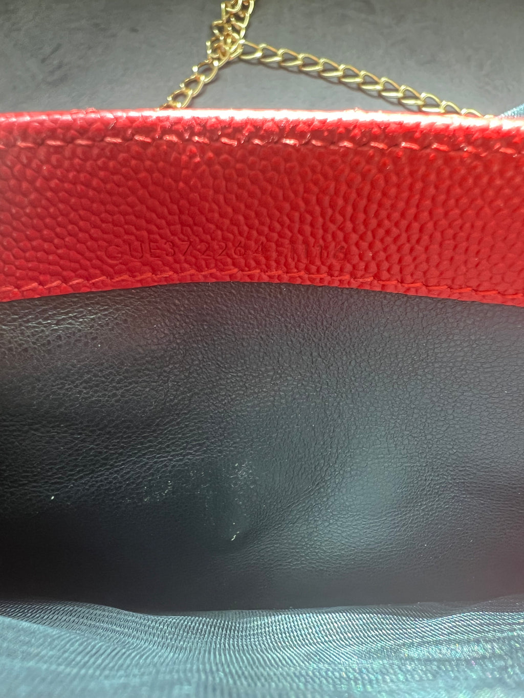 Yves Saint Laurent Cassandre envelope wallet on chain red