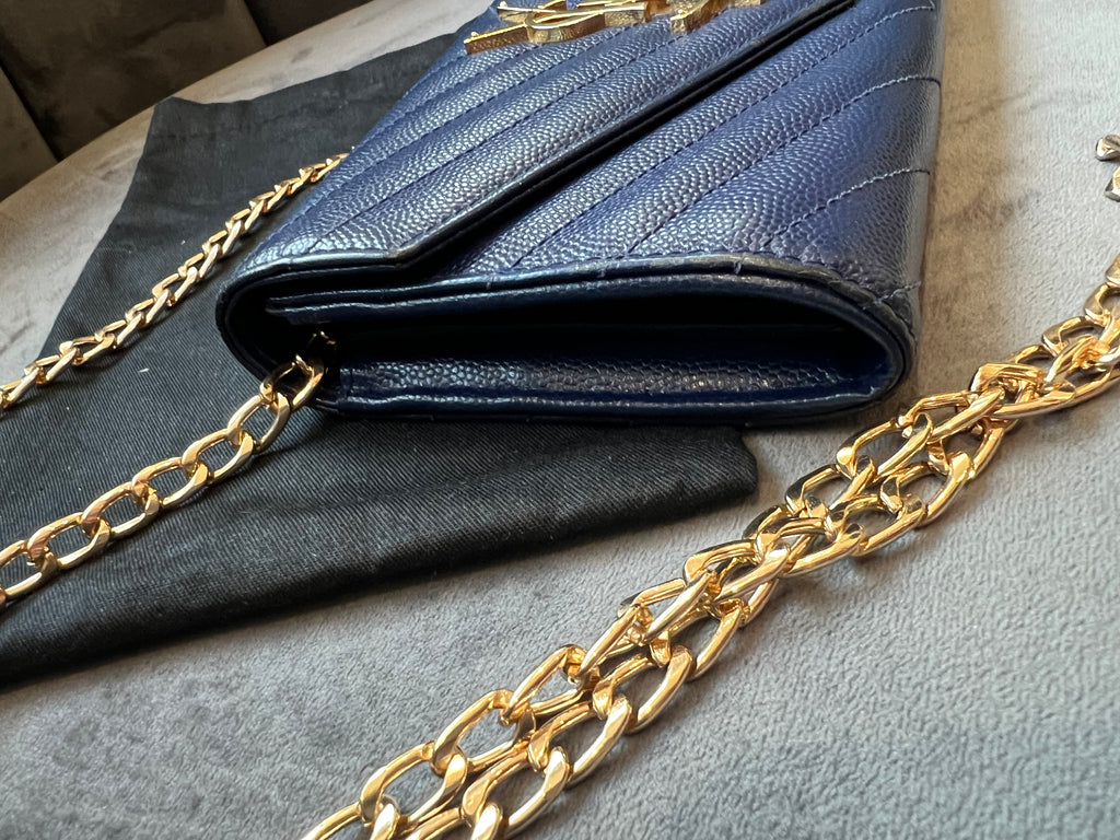 YSL monogram envelope flap wallet on chain