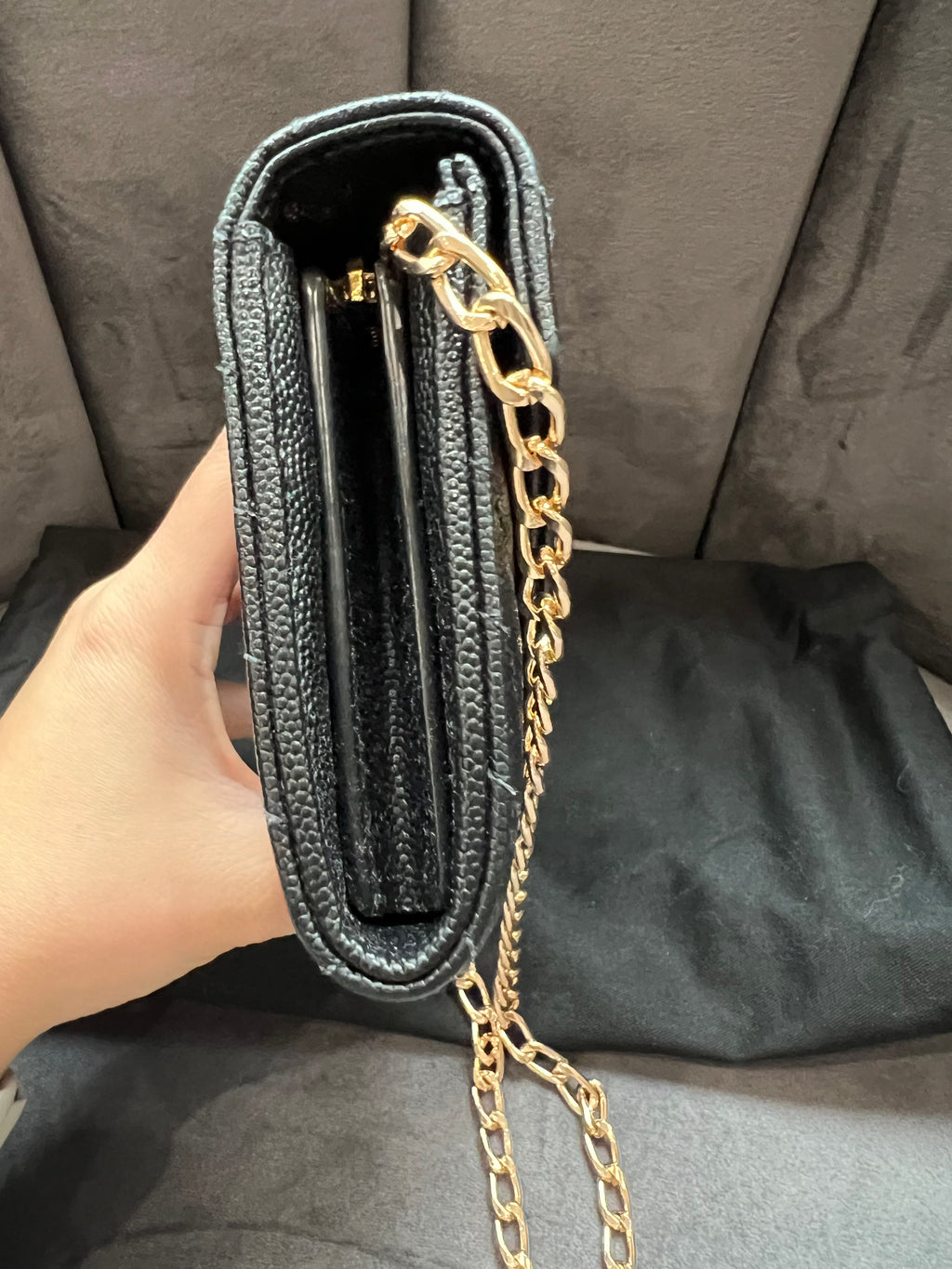 Black YSL cassandre envelope wallet on chain