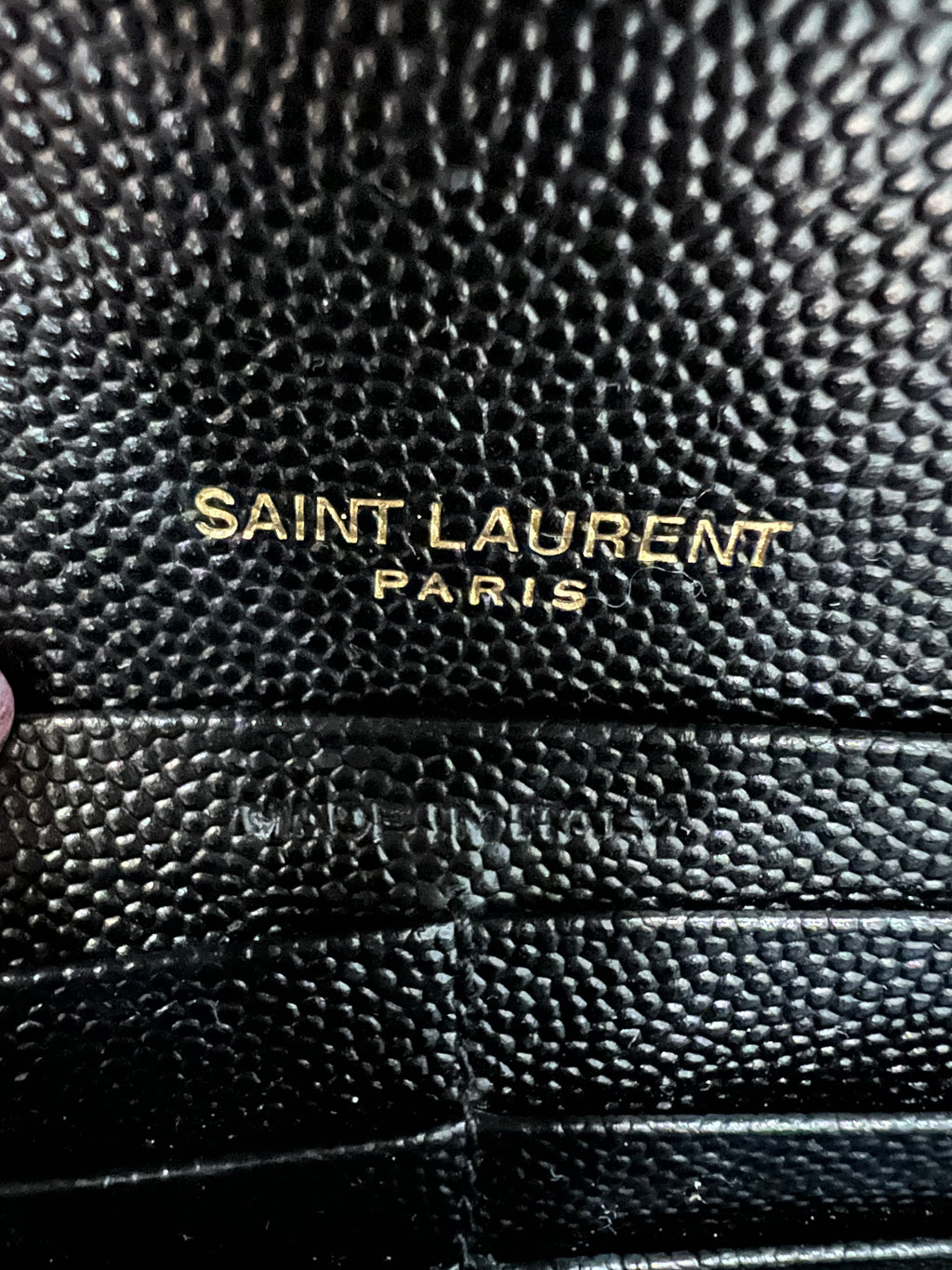 Black YSL cassandre envelope wallet on chain