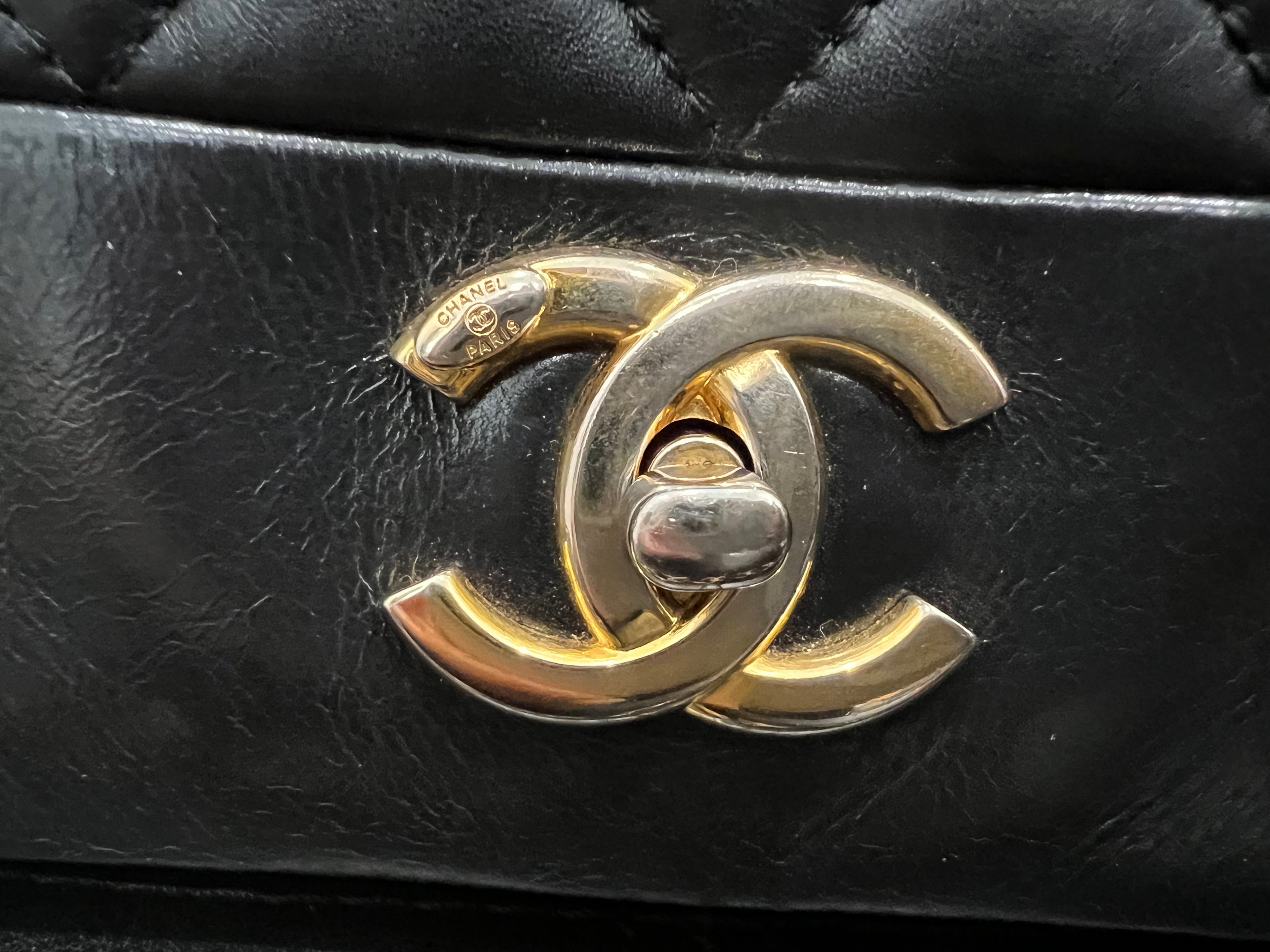 Chanel black single flap quilted handbag