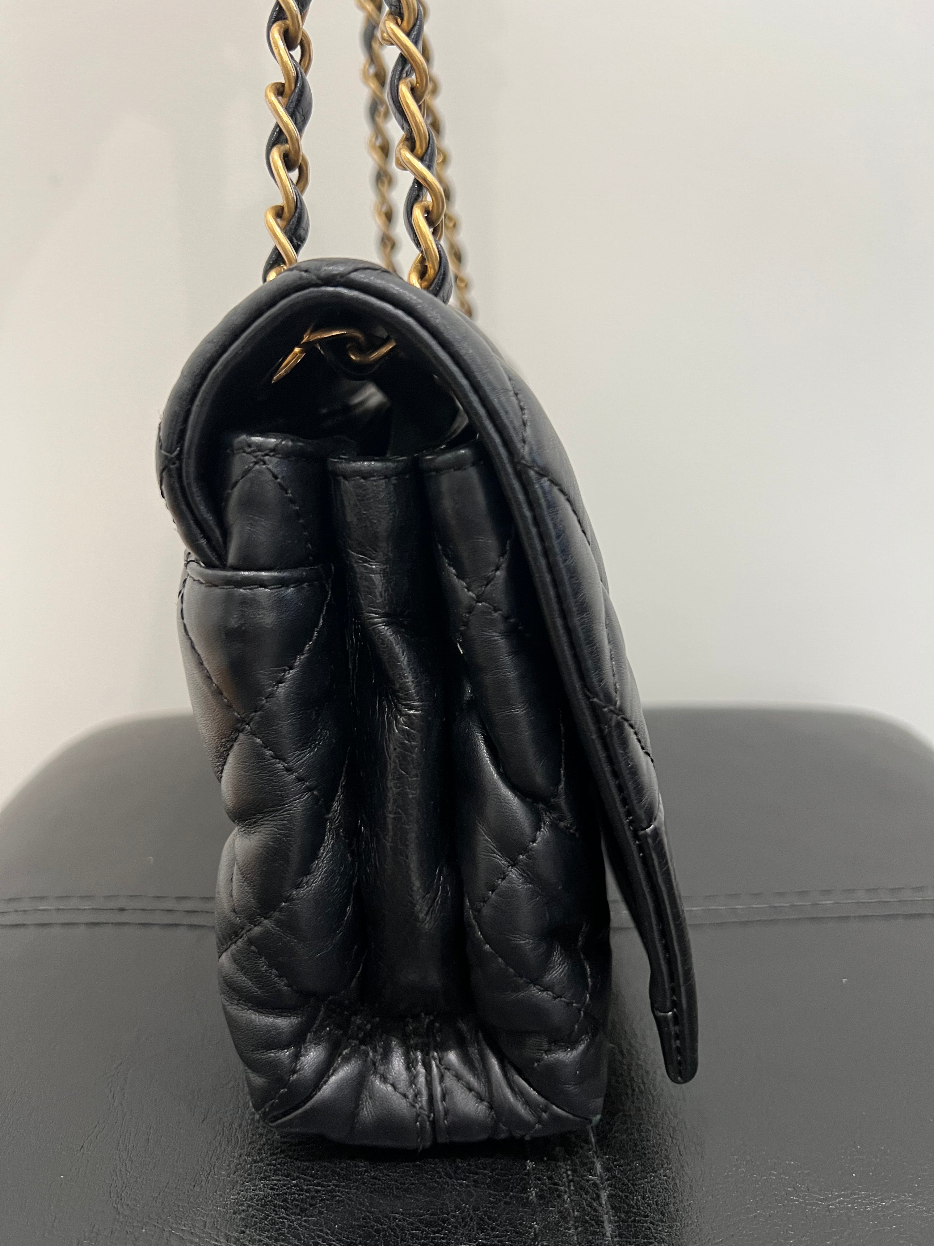 Chanel black single flap quilted handbag