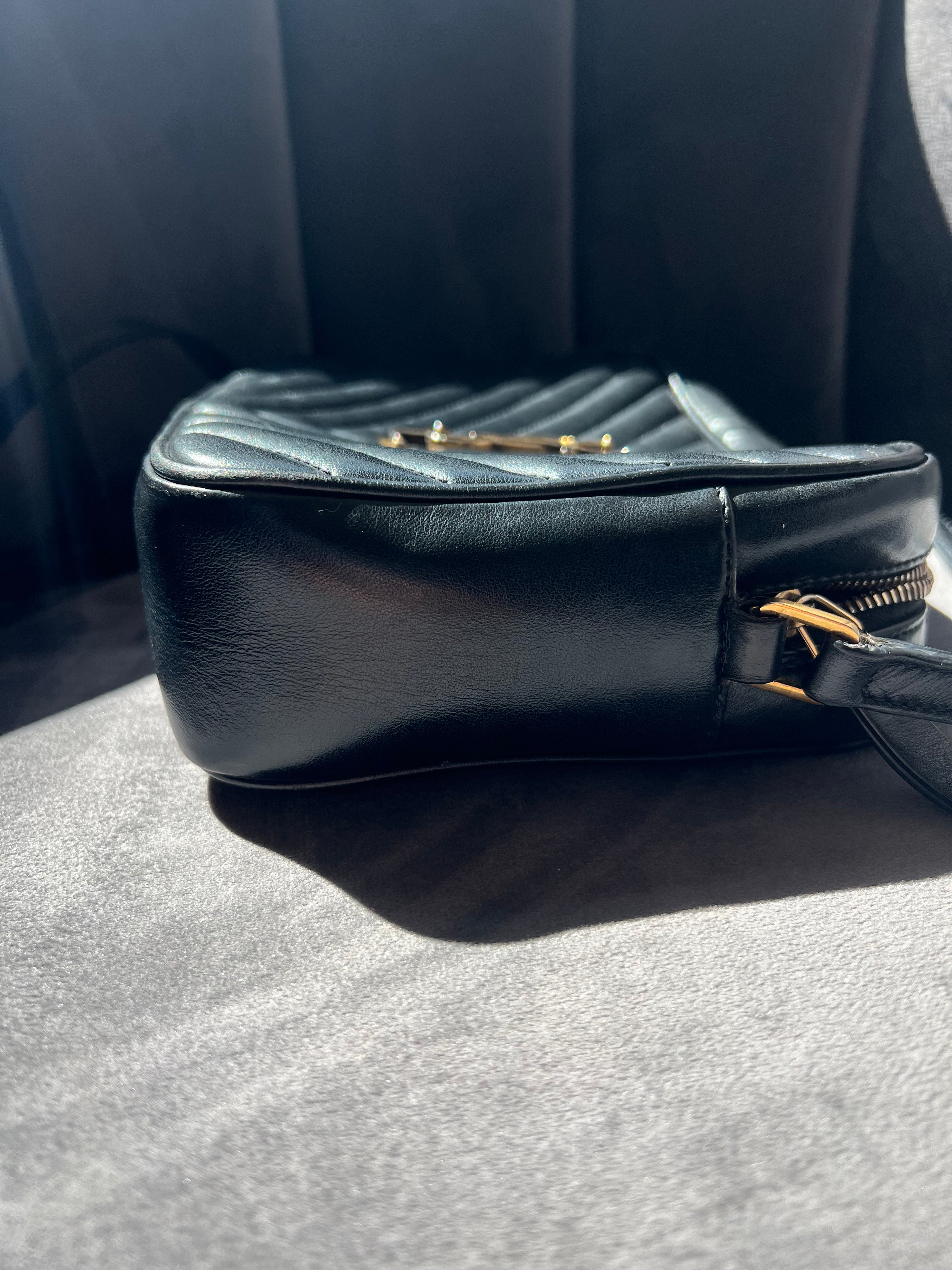 YSL camera bag quilted with gold hardware