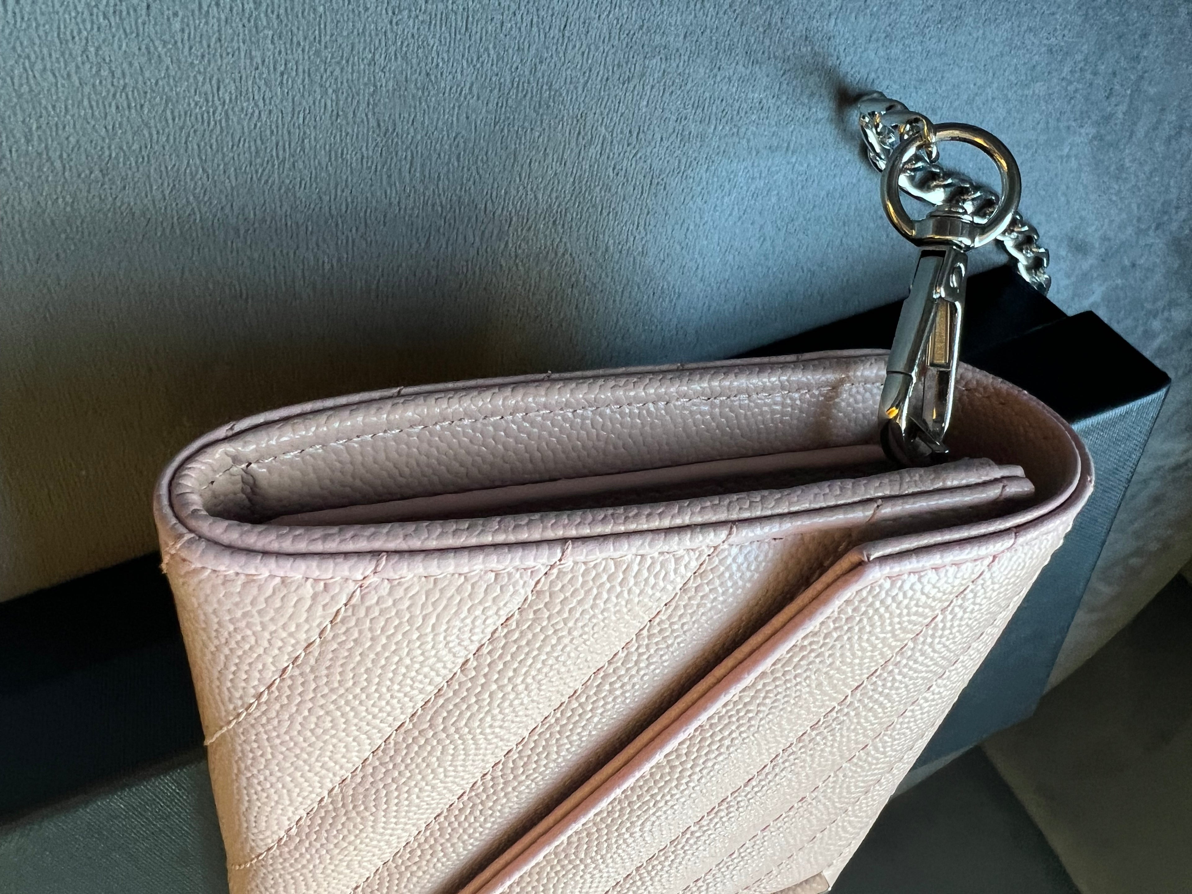 Pink YSL cassandre wallet on chain
