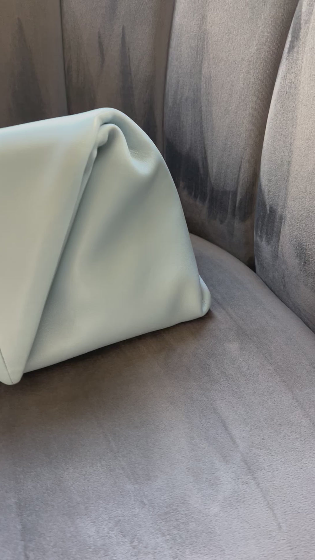 Bottega Veneta trine clutch wristlet