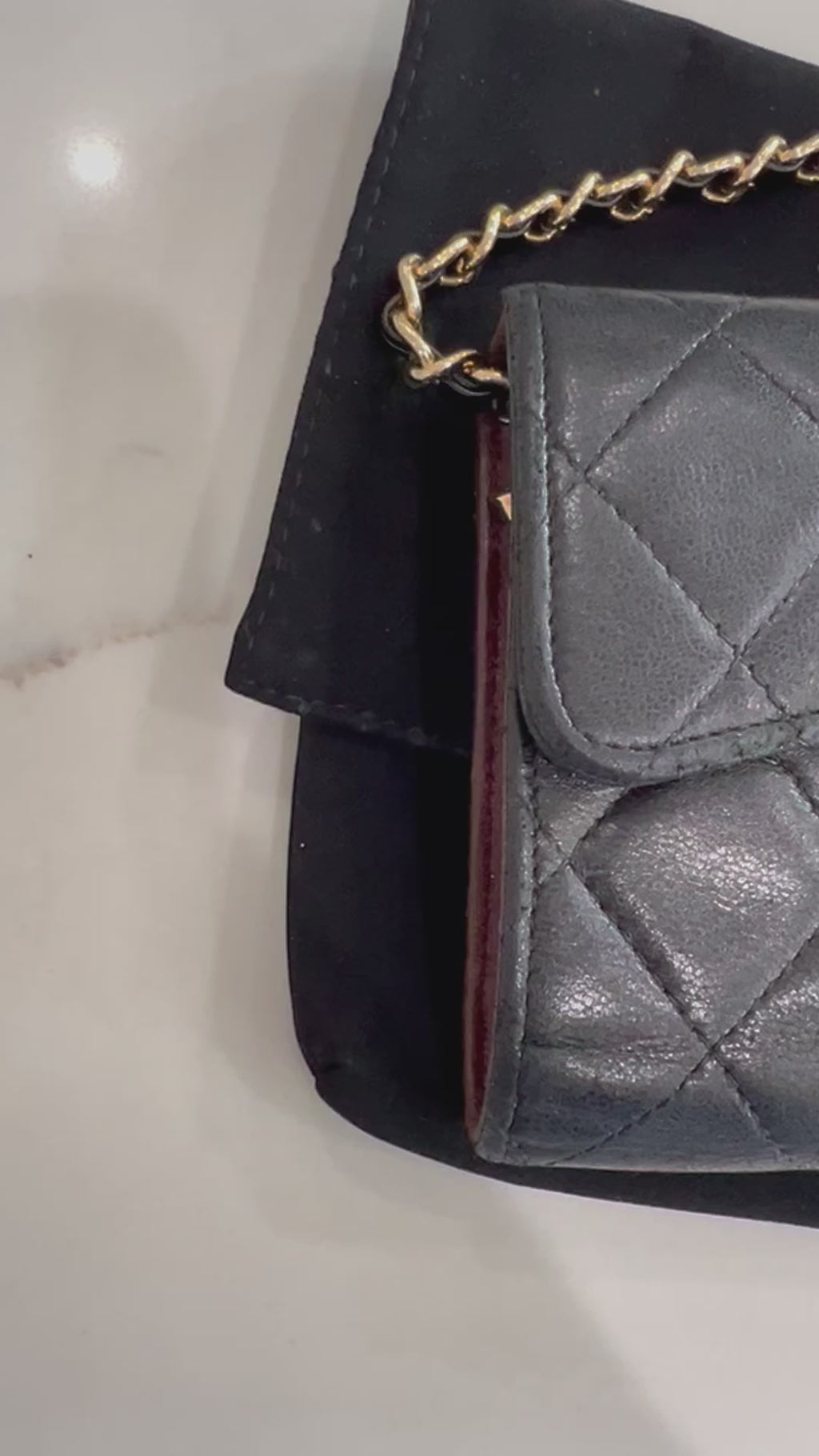 Black Chanel timeless wallet on chain
